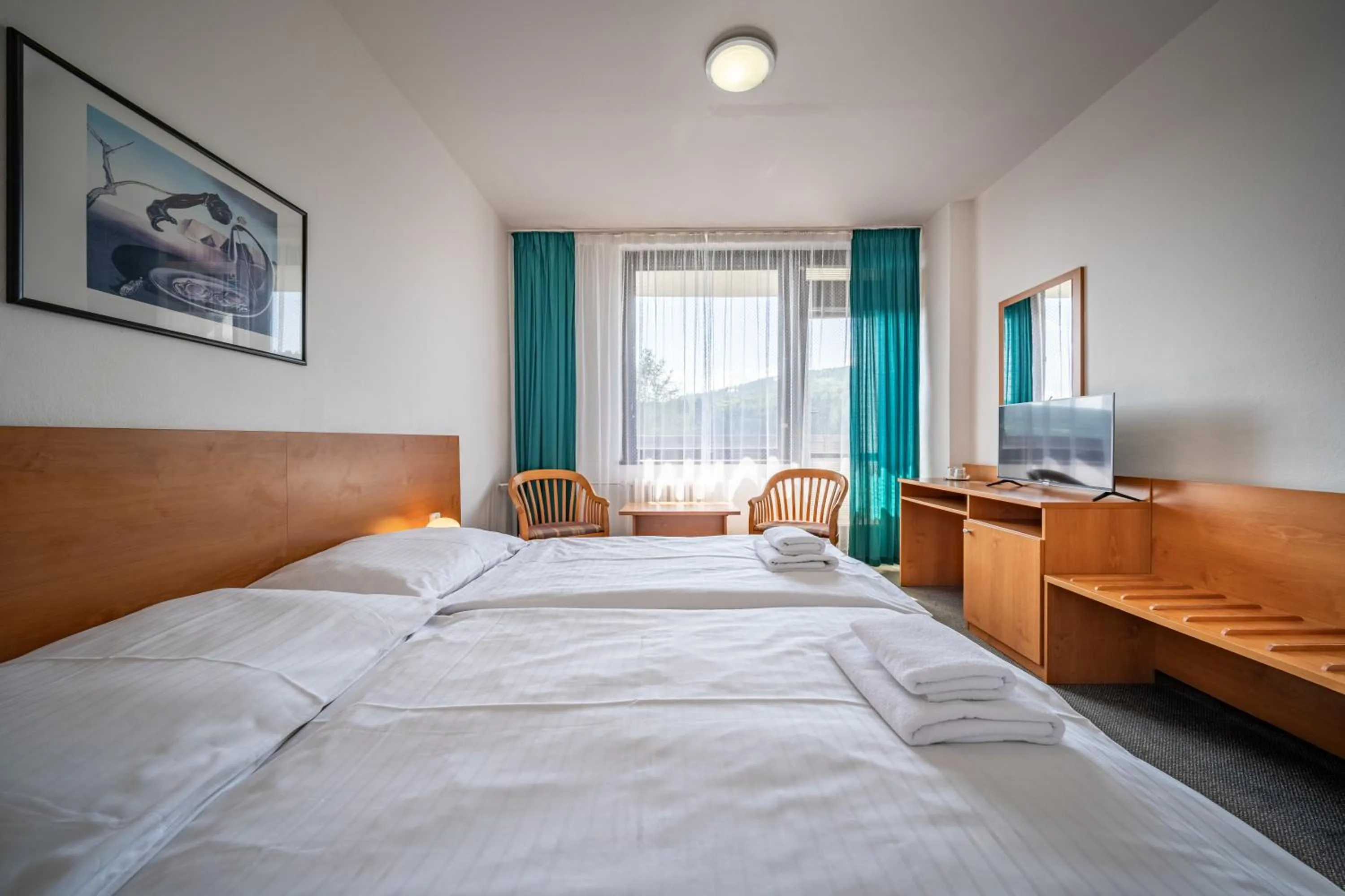 Bed in Hotel Adamantino