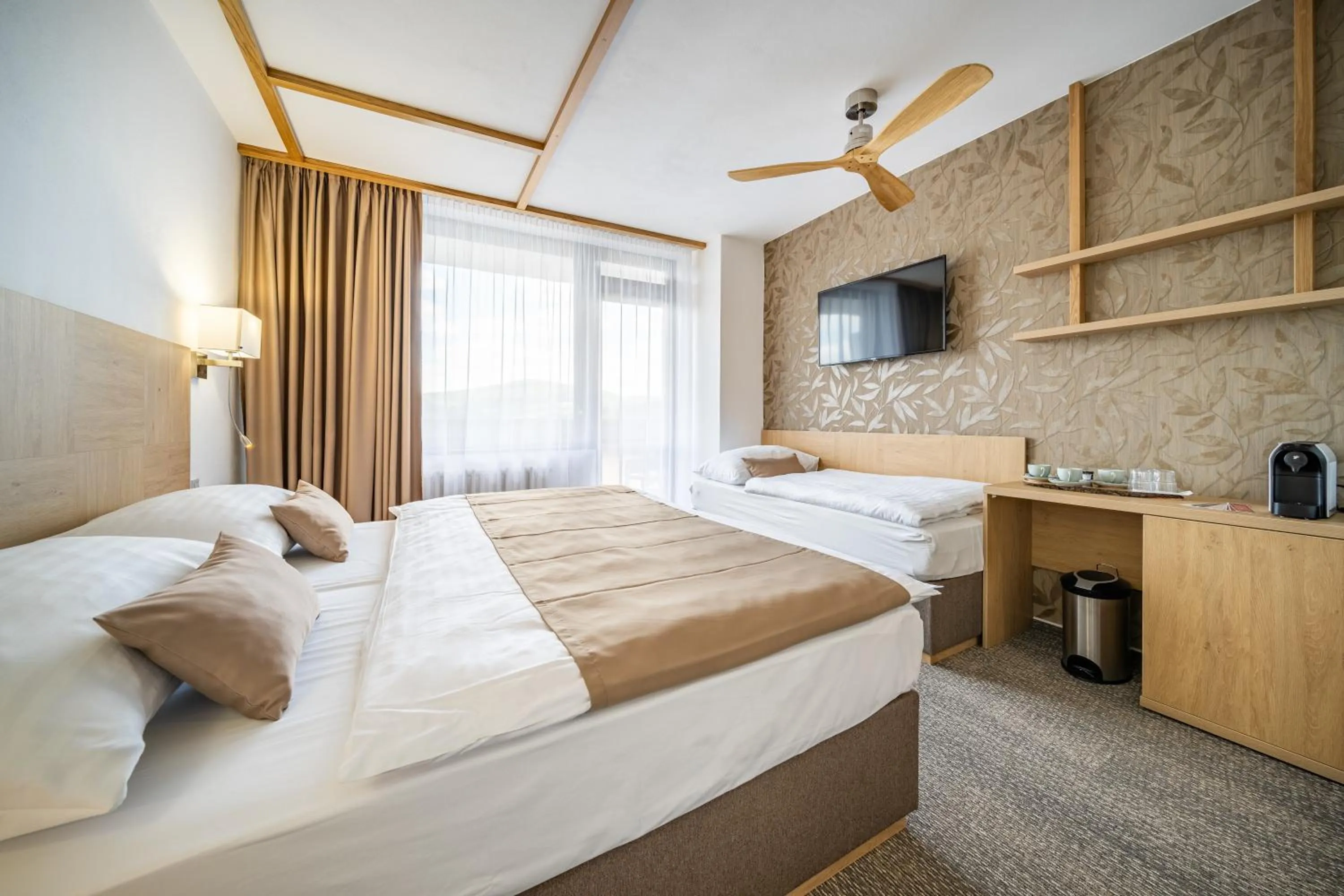 Bed in Hotel Adamantino