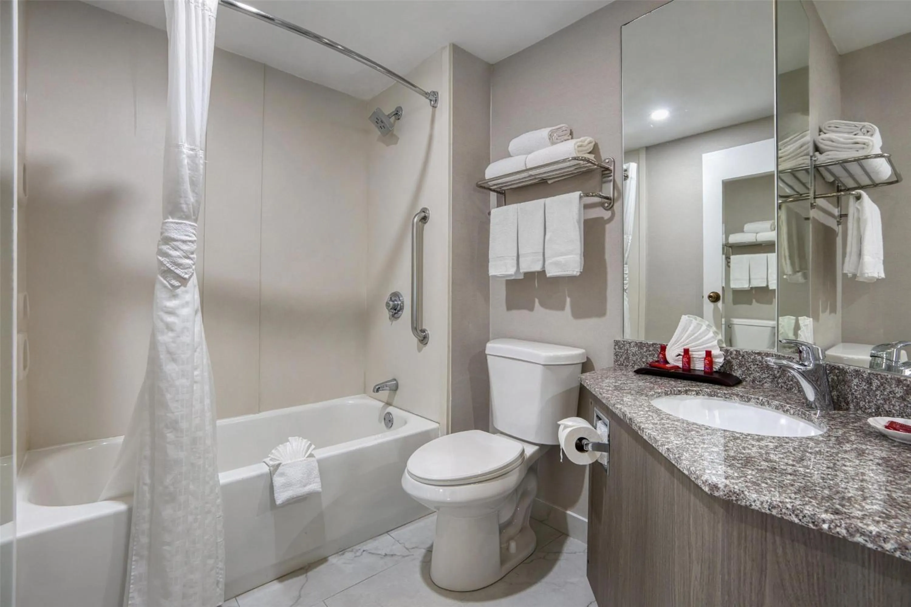 Bathroom in SureStay Plus Hotel by Best Western Chicago Lombard