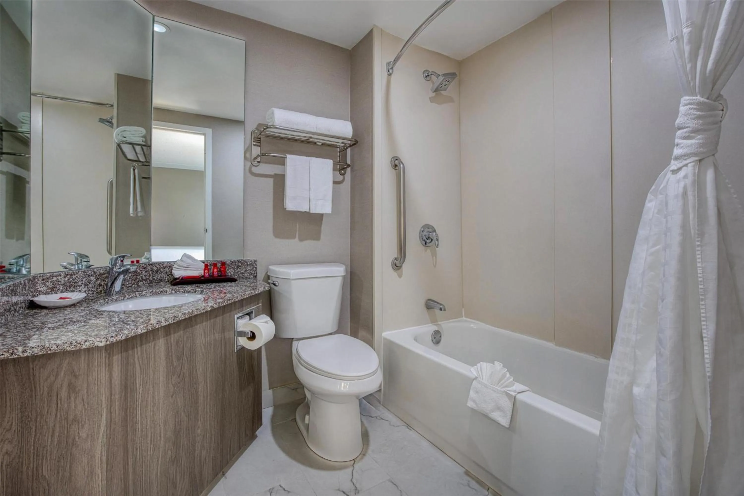 Bathroom in SureStay Plus Hotel by Best Western Chicago Lombard