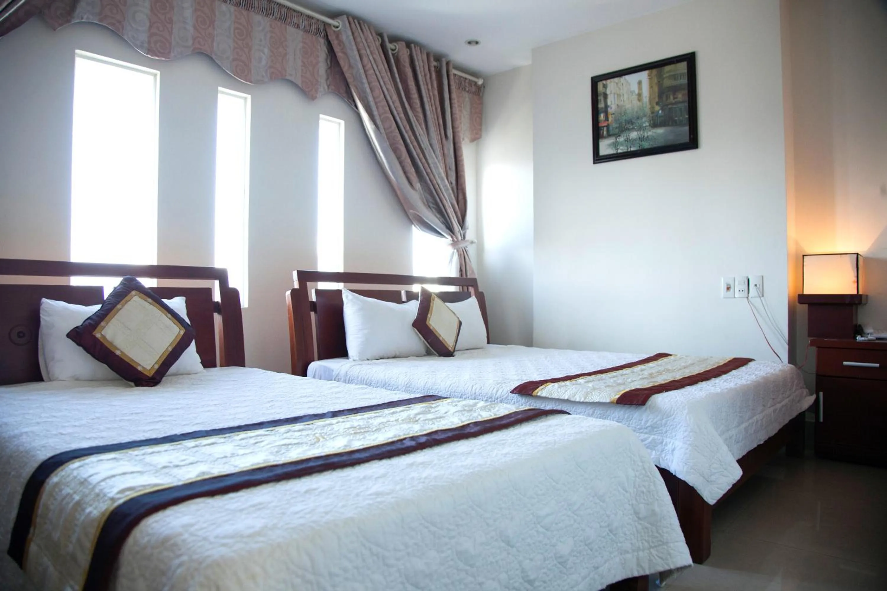 Bed in Hoang Thuy Sinh Hotel