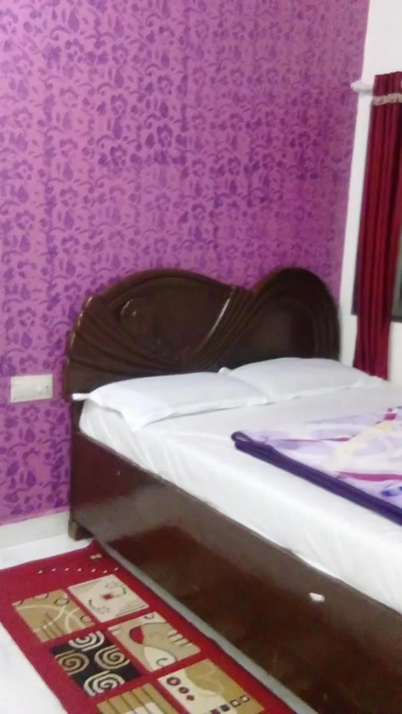Bed in Om Datta Krupa Niwas Cottage