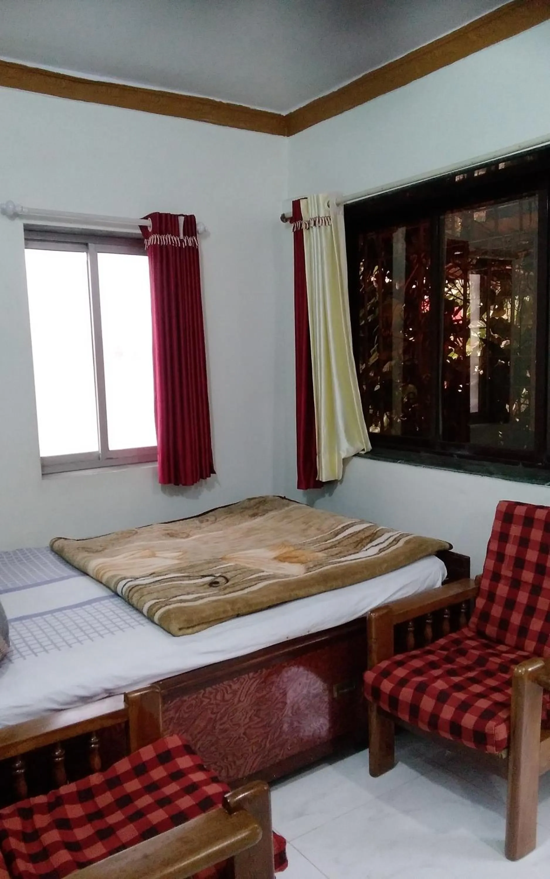 Seating area, Bed in Om Datta Krupa Niwas Cottage