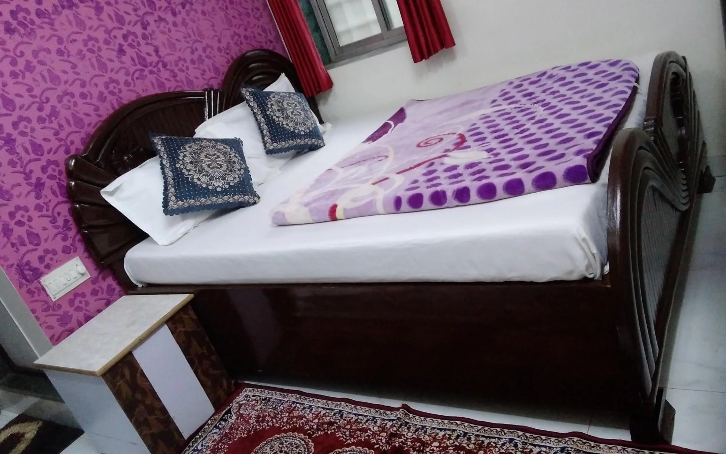 Bed in Om Datta Krupa Niwas Cottage