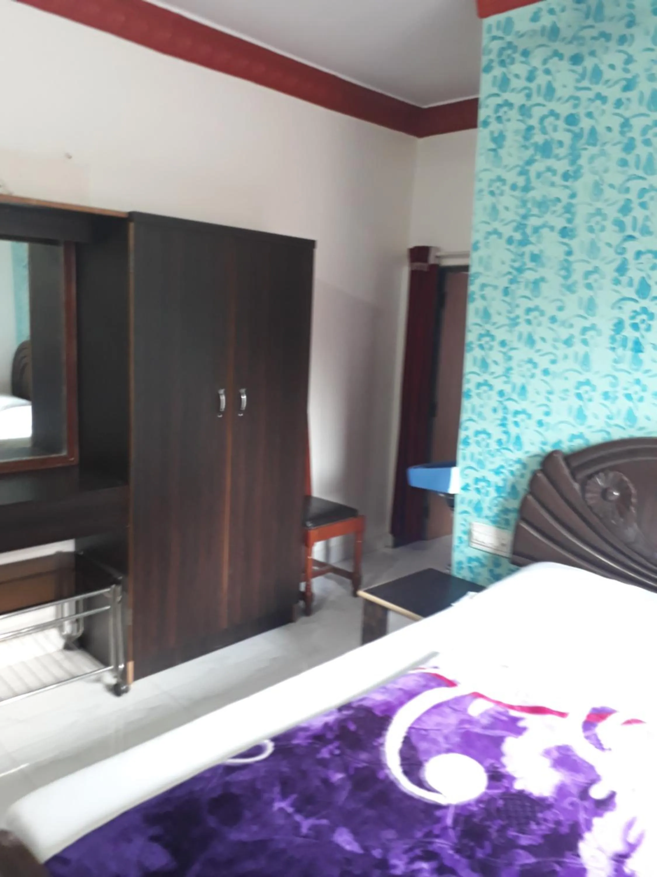 Bed in Om Datta Krupa Niwas Cottage