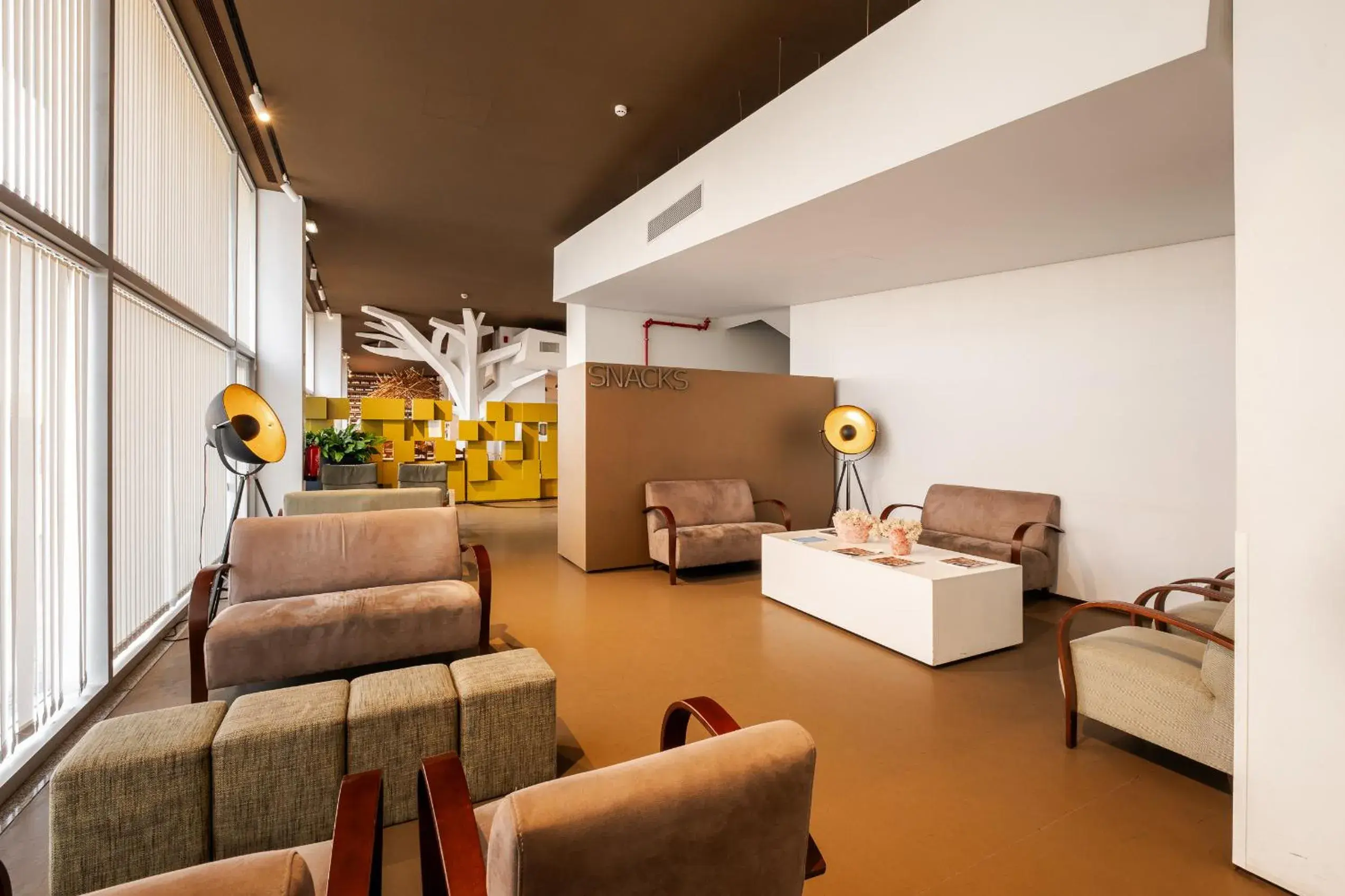 Lobby or reception in Basic Braga by Axis Lobby or reception in Basic Braga by Axis