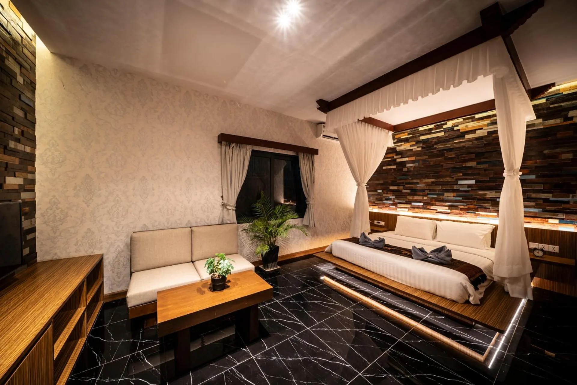 Seating area, Bed in The Local Time Village