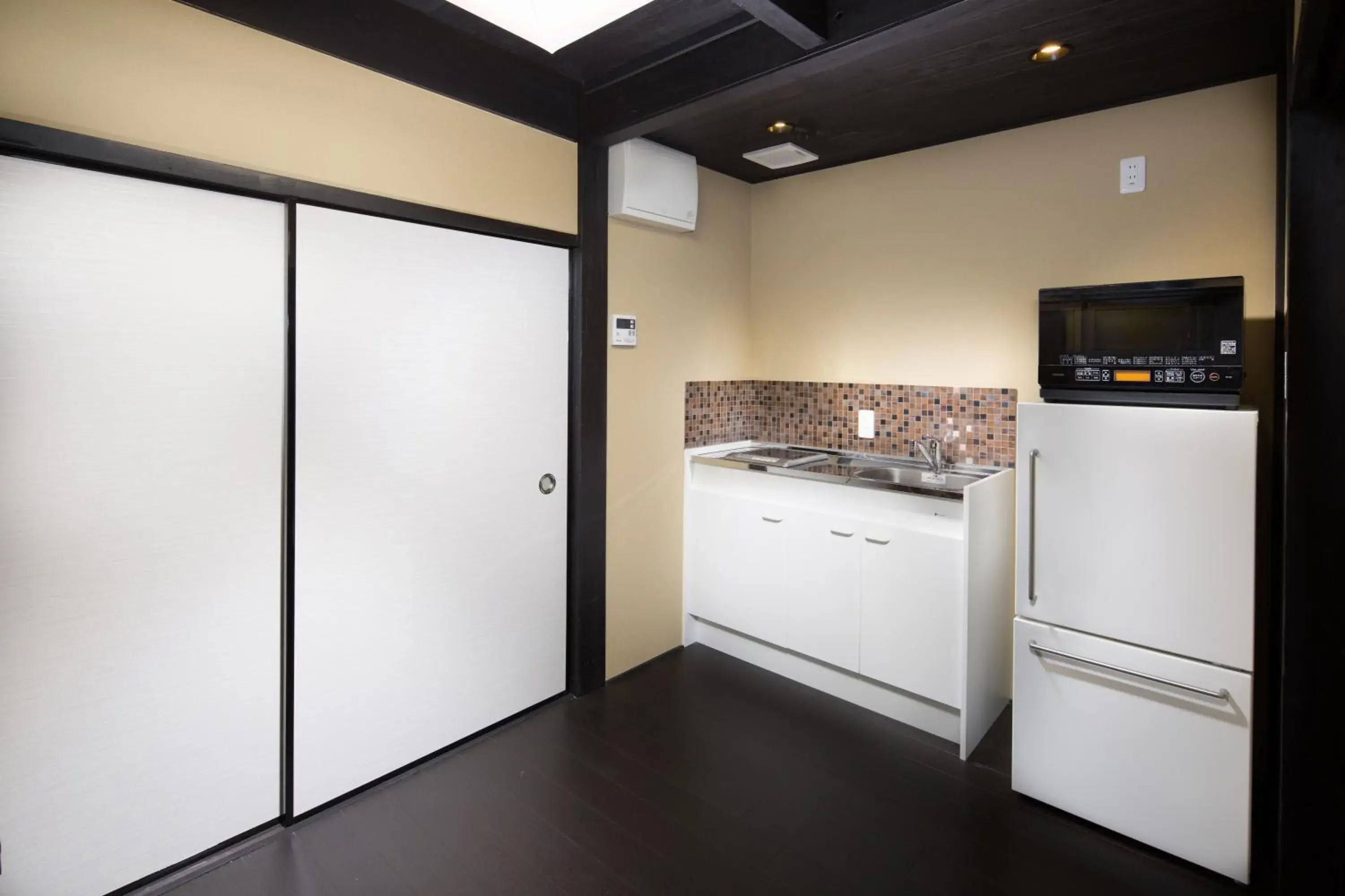 Kitchen or kitchenette in Tsumugi Matsubara Sakaimachi Kitchen or kitchenette in Tsumugi Matsubara Sakaimachi