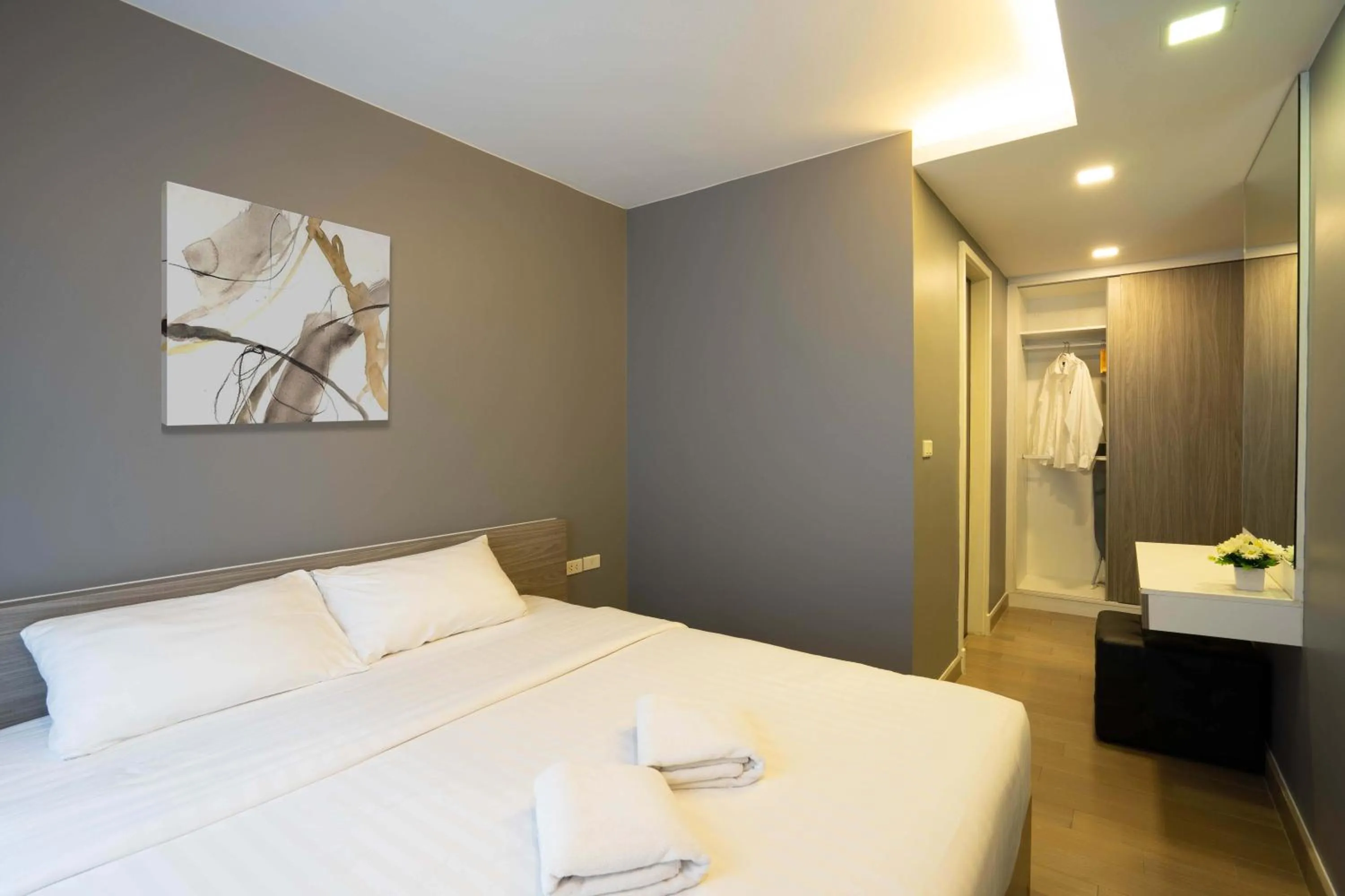 Bed in Dazzle Residence