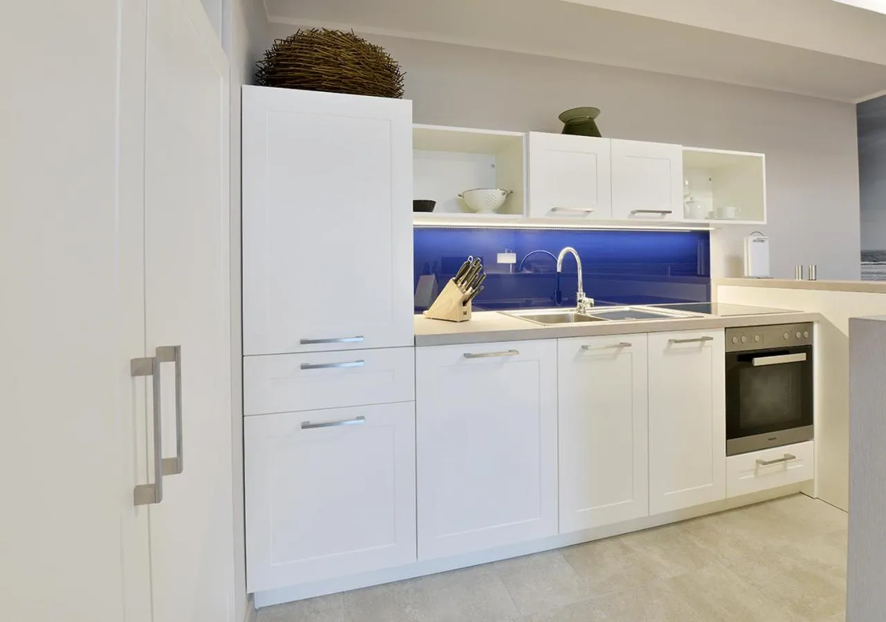 Kitchen or kitchenette in DORMERO Strandhotel Rügen