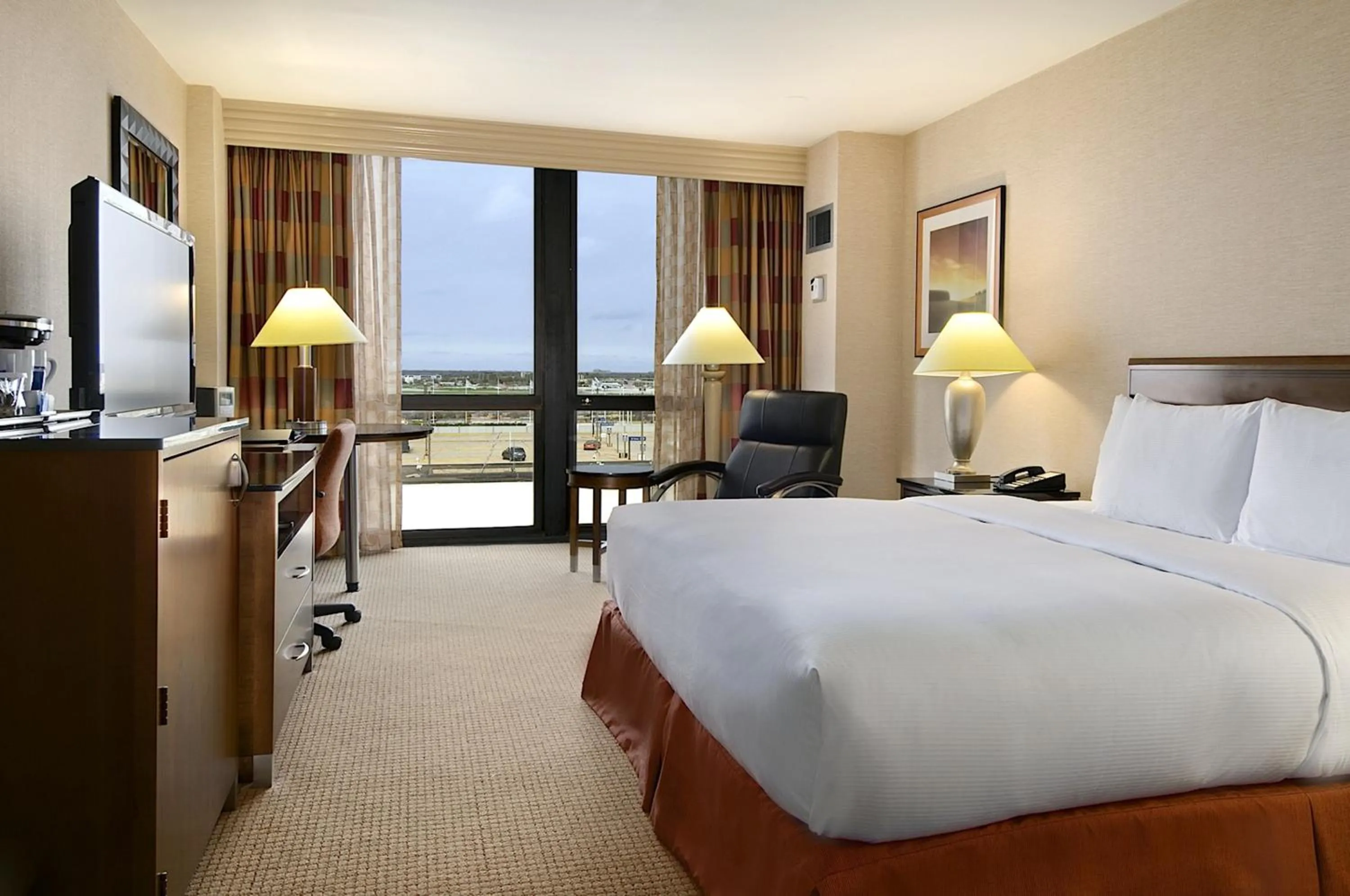 Bed in Hilton Chicago O'Hare Airport