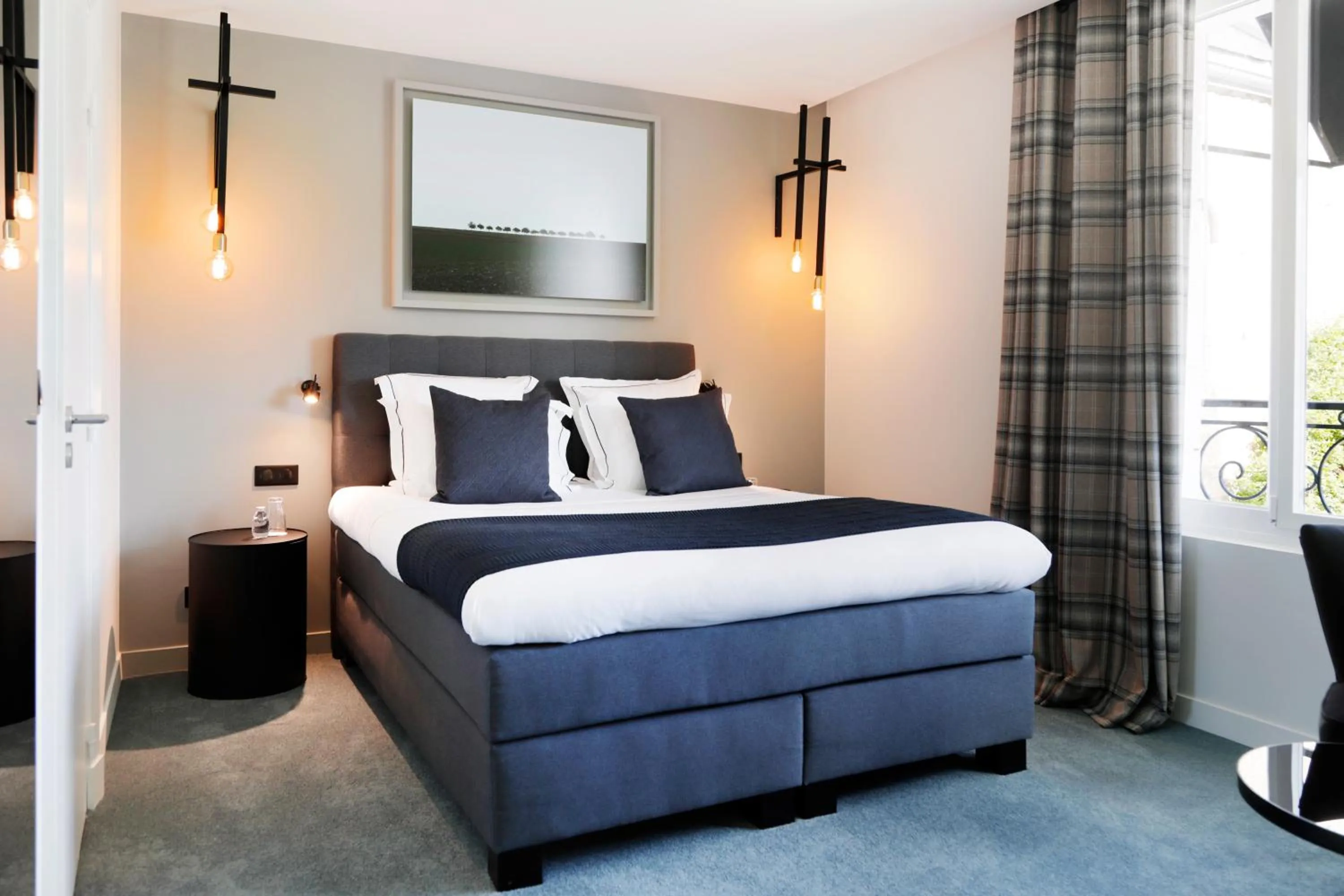 Bed in Hôtel-Restaurant Bel Ami