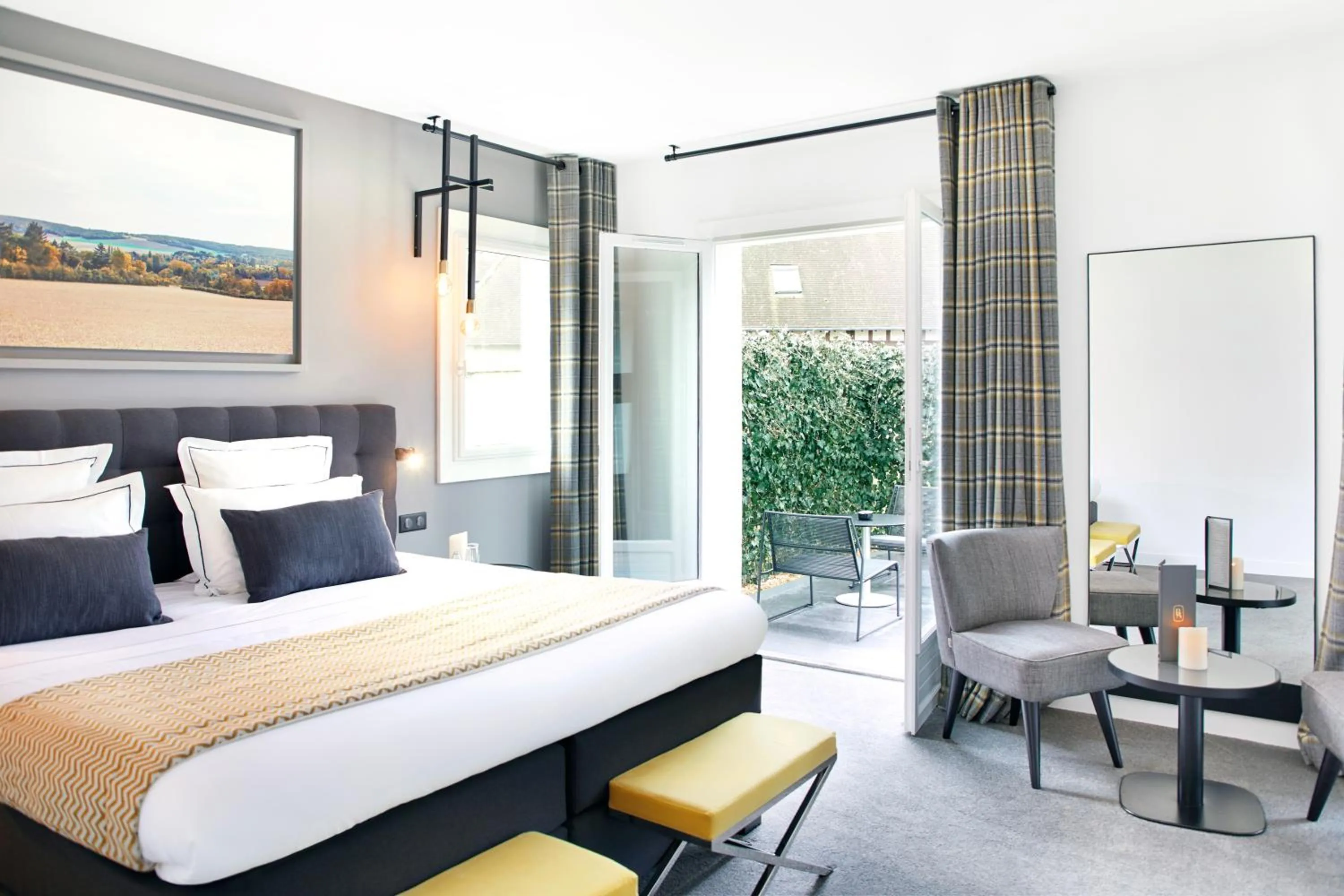 Balcony/Terrace, Bed in Hôtel-Restaurant Bel Ami