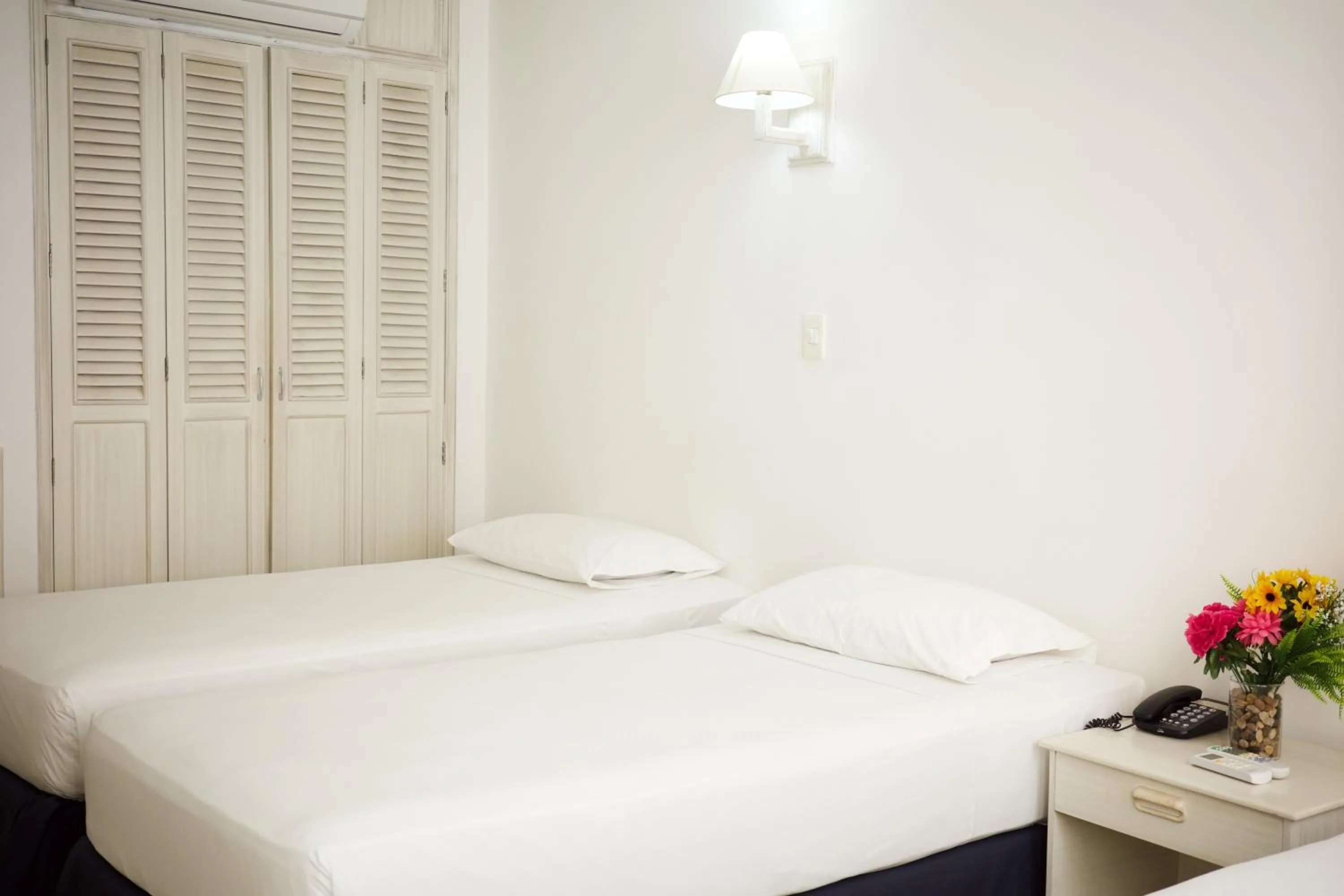 Bed in Hotel La Riviera