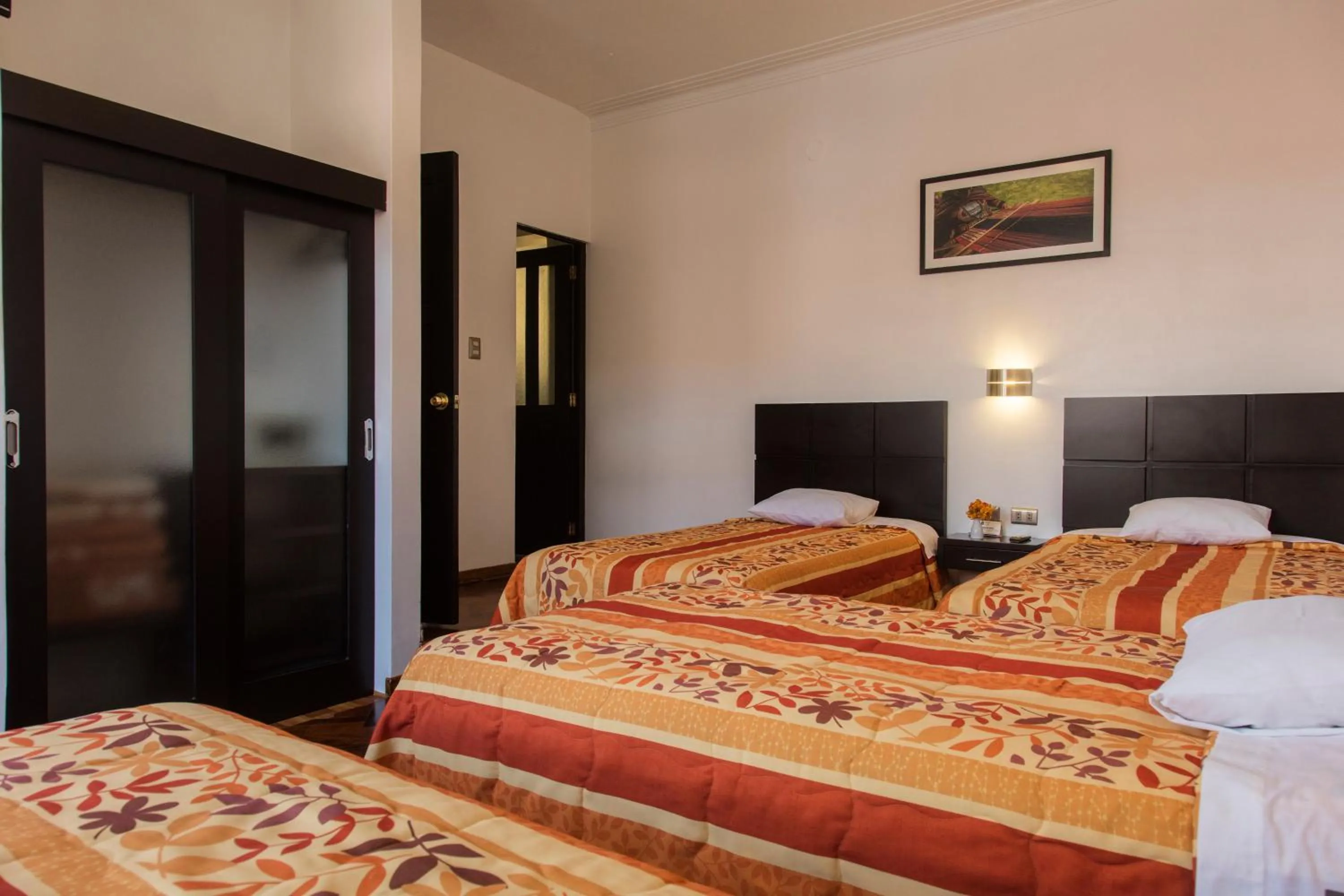 Photo of the whole room, Bed in Hostal & Apartments El Triunfo