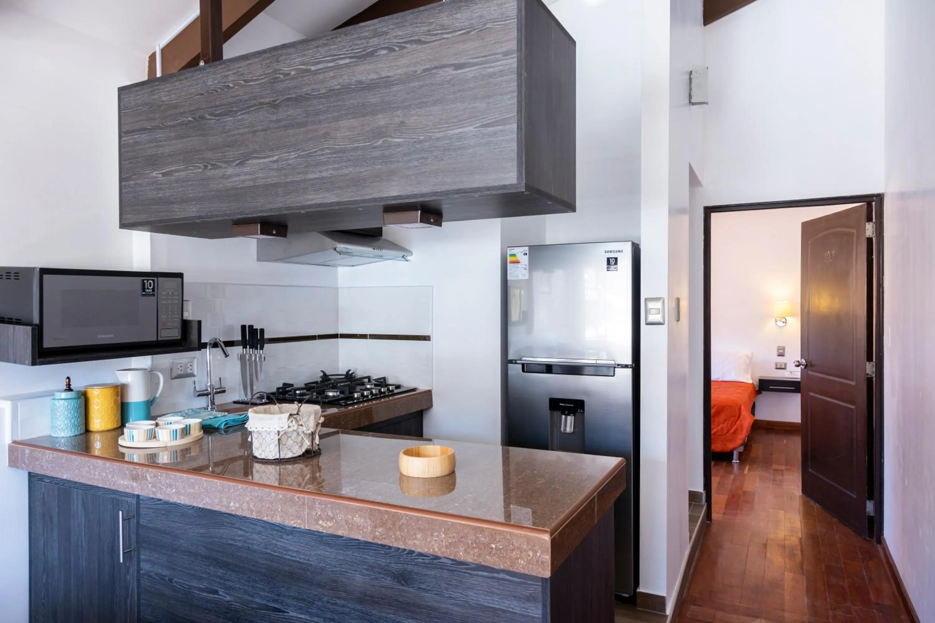 Kitchen or kitchenette in Hostal & Apartments El Triunfo