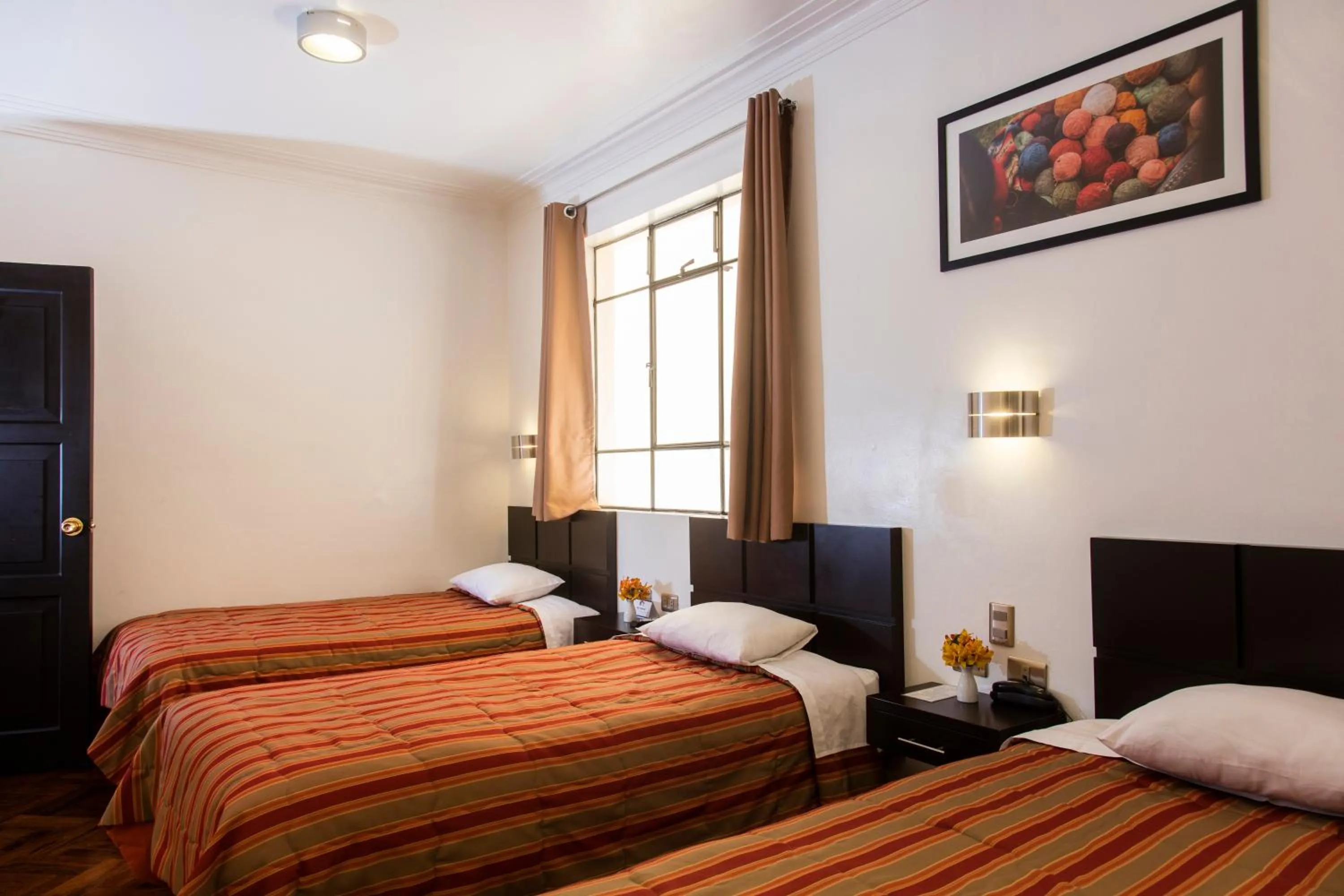 Photo of the whole room, Bed in Hostal & Apartments El Triunfo