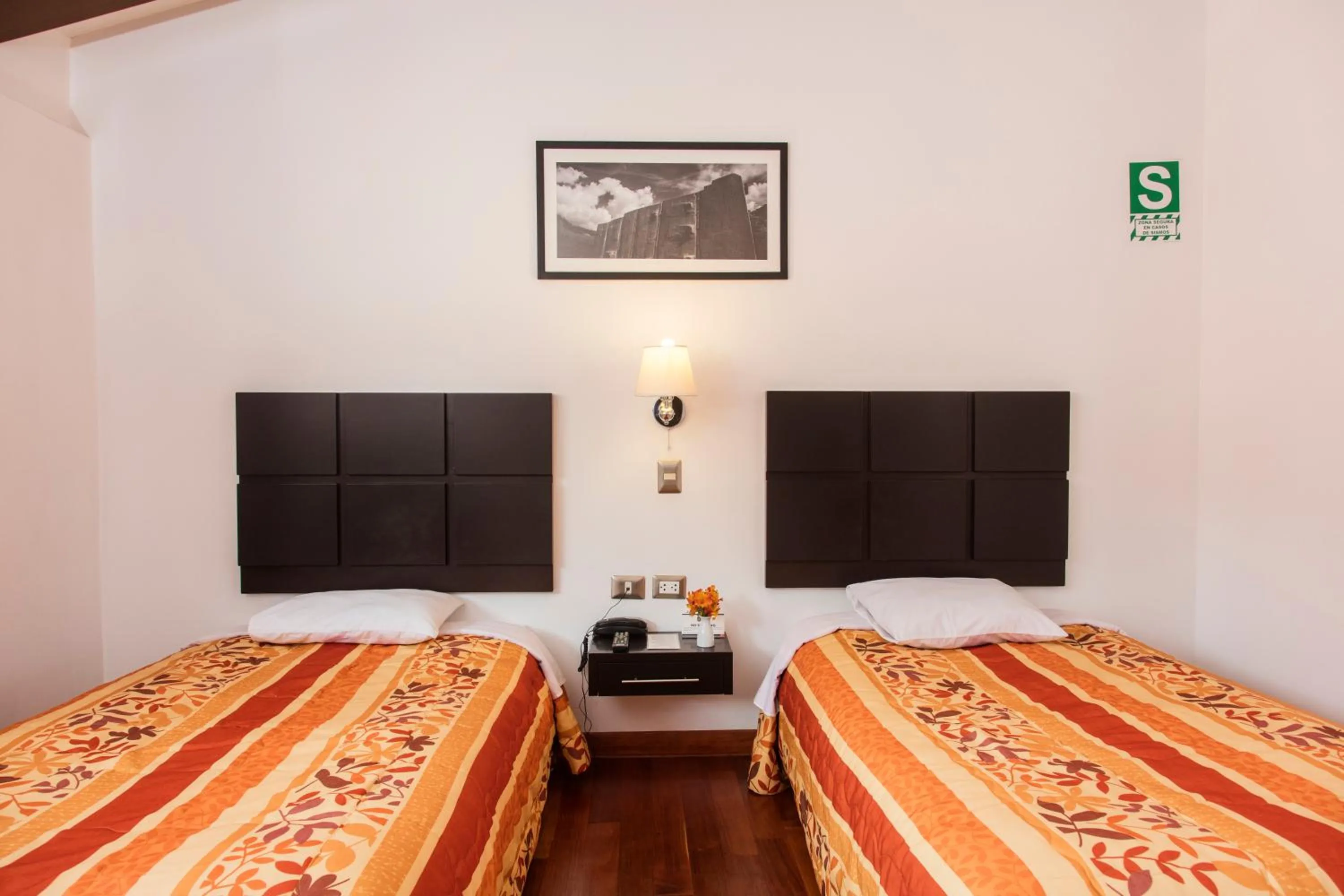 Photo of the whole room, Bed in Hostal & Apartments El Triunfo