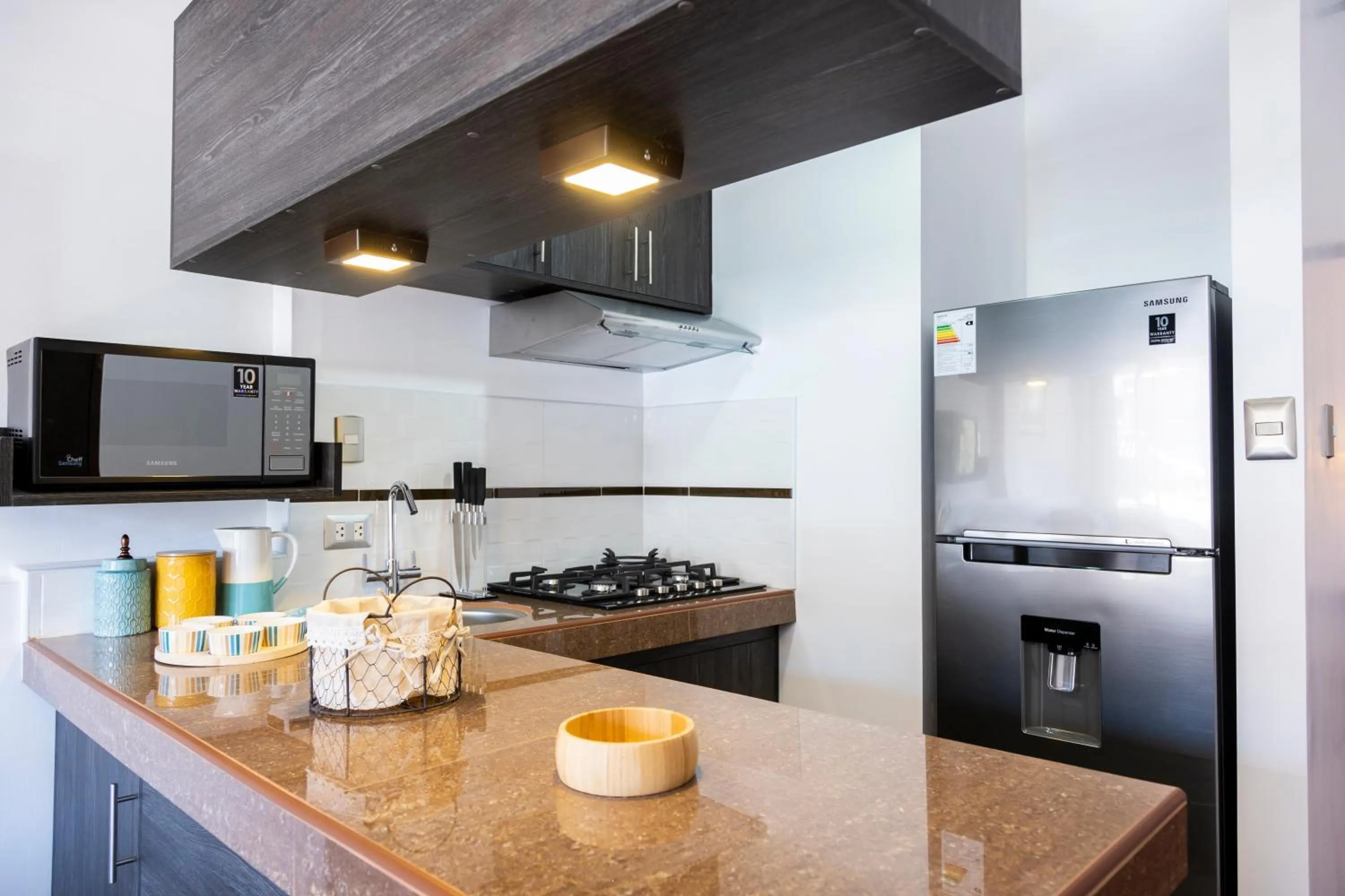 Kitchen or kitchenette in Hostal & Apartments El Triunfo