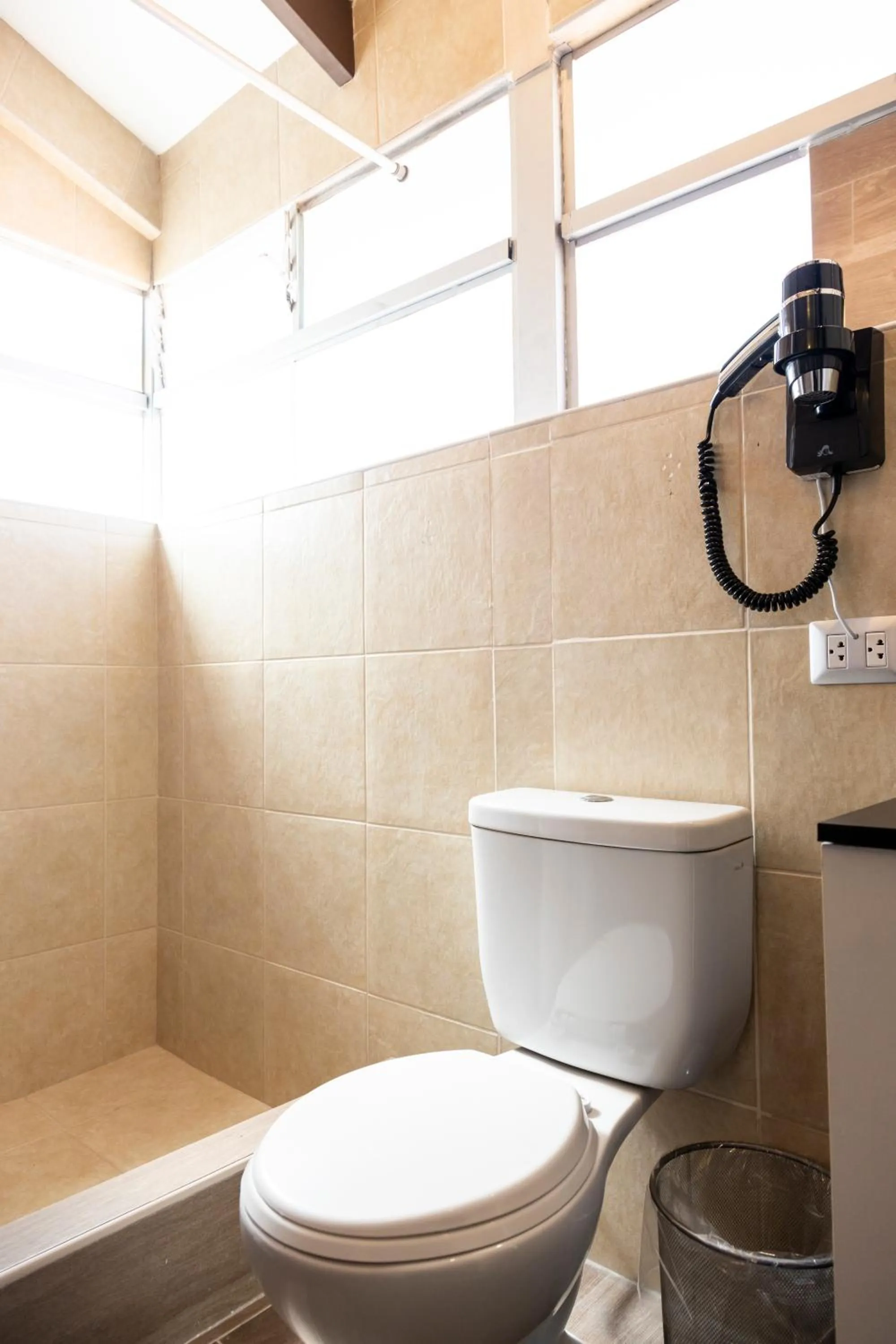 Bathroom in Hostal & Apartments El Triunfo