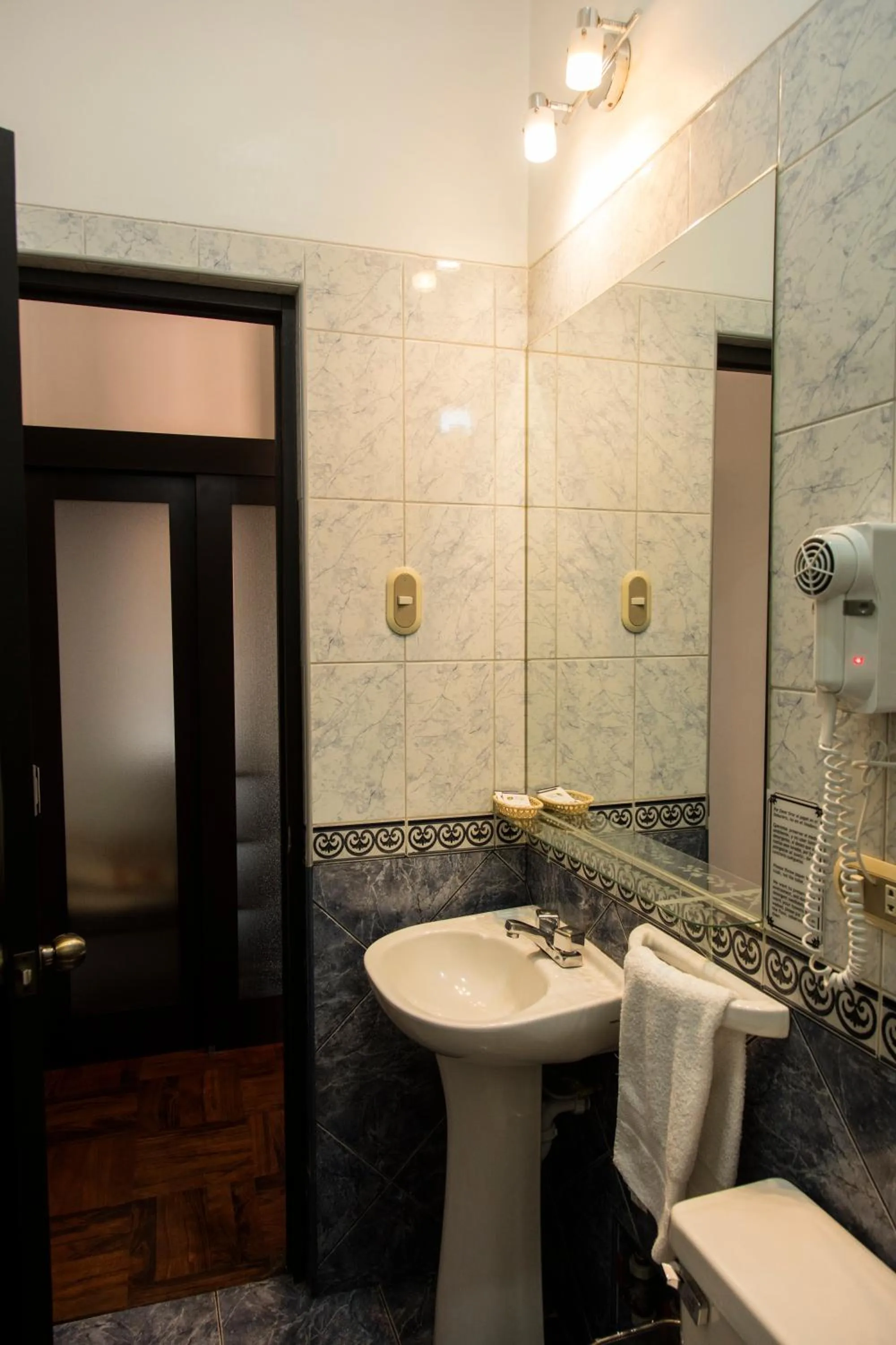 Bathroom in Hostal & Apartments El Triunfo