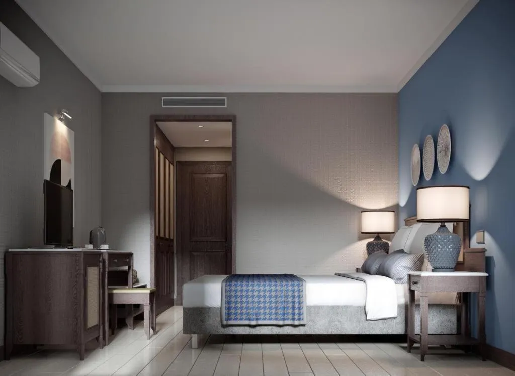 Bed in Lara Park Hotel