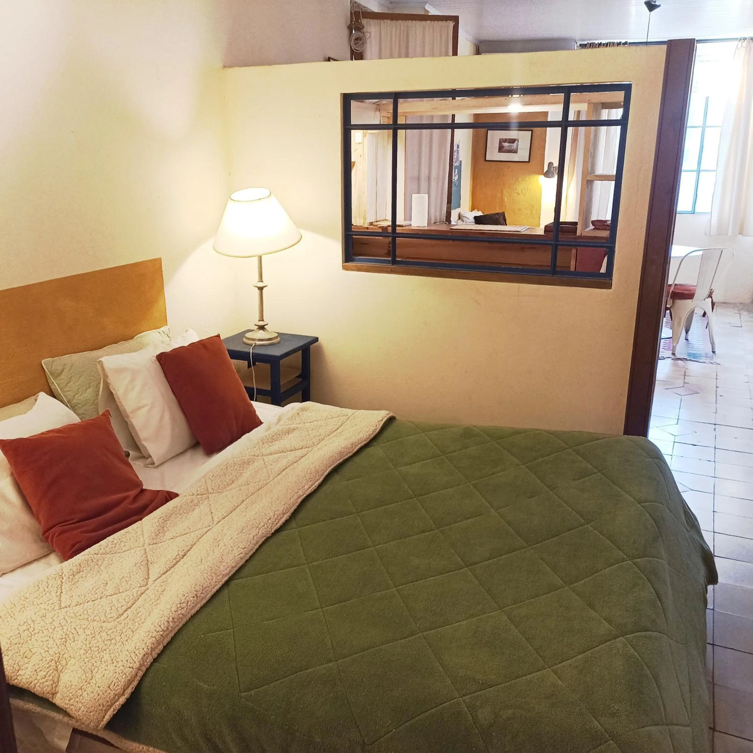 Bed in Colonia Suite Apartments