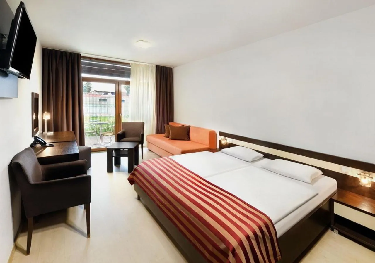 View (from property/room), Bed in Hotel Bešeňová