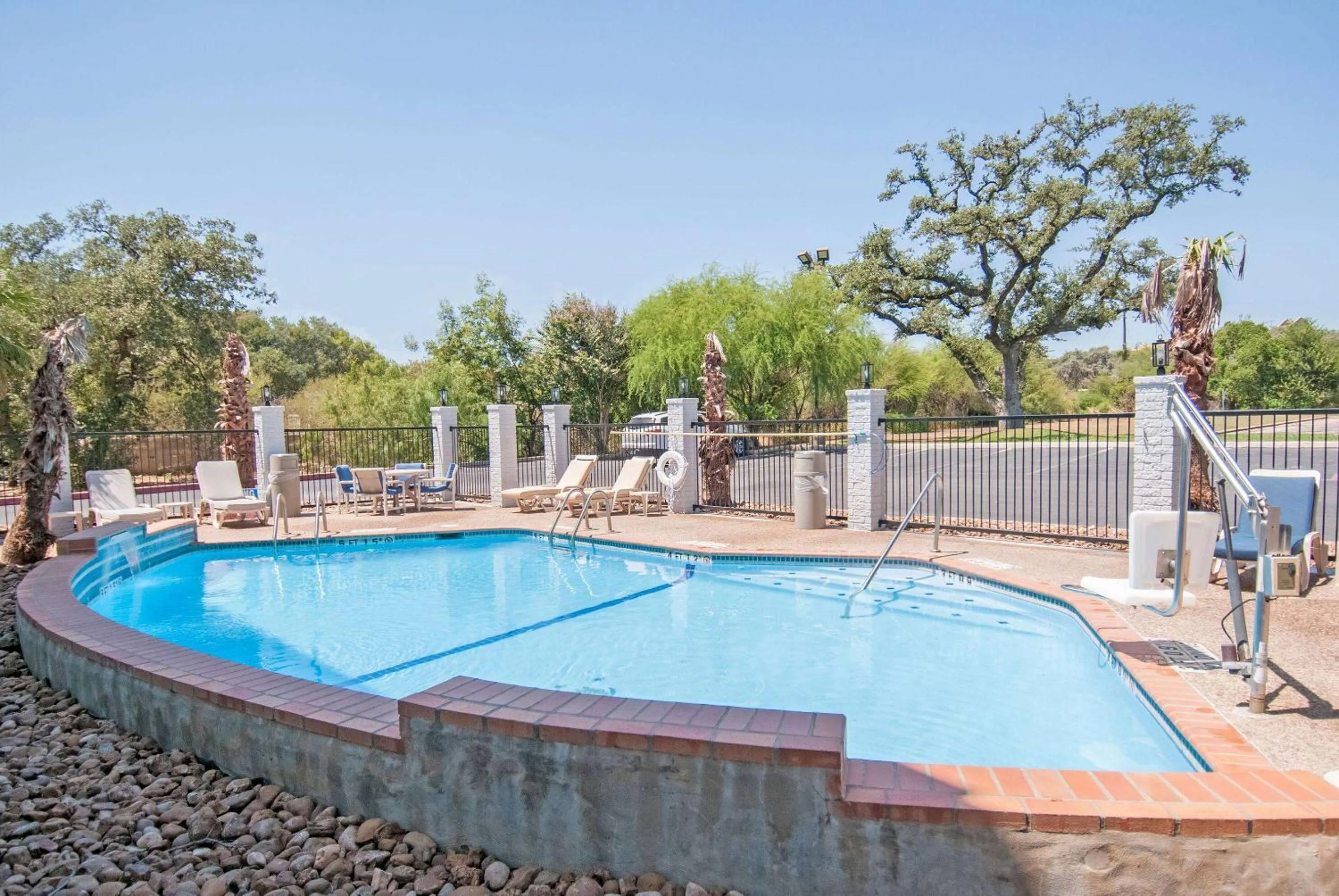 Pool view in Days Inn & Suites by Wyndham San Antonio North/Stone Oak