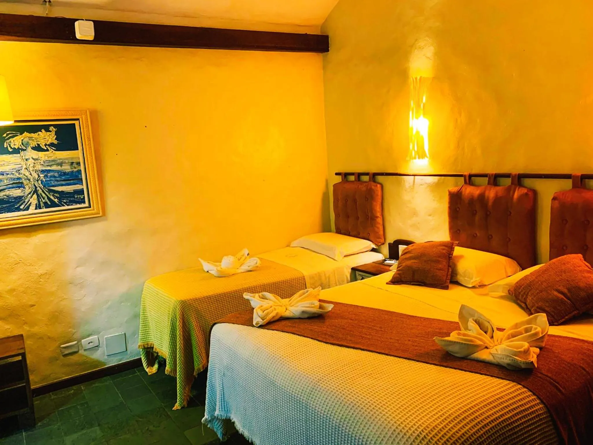 Bed in Pousada Dos Artistas