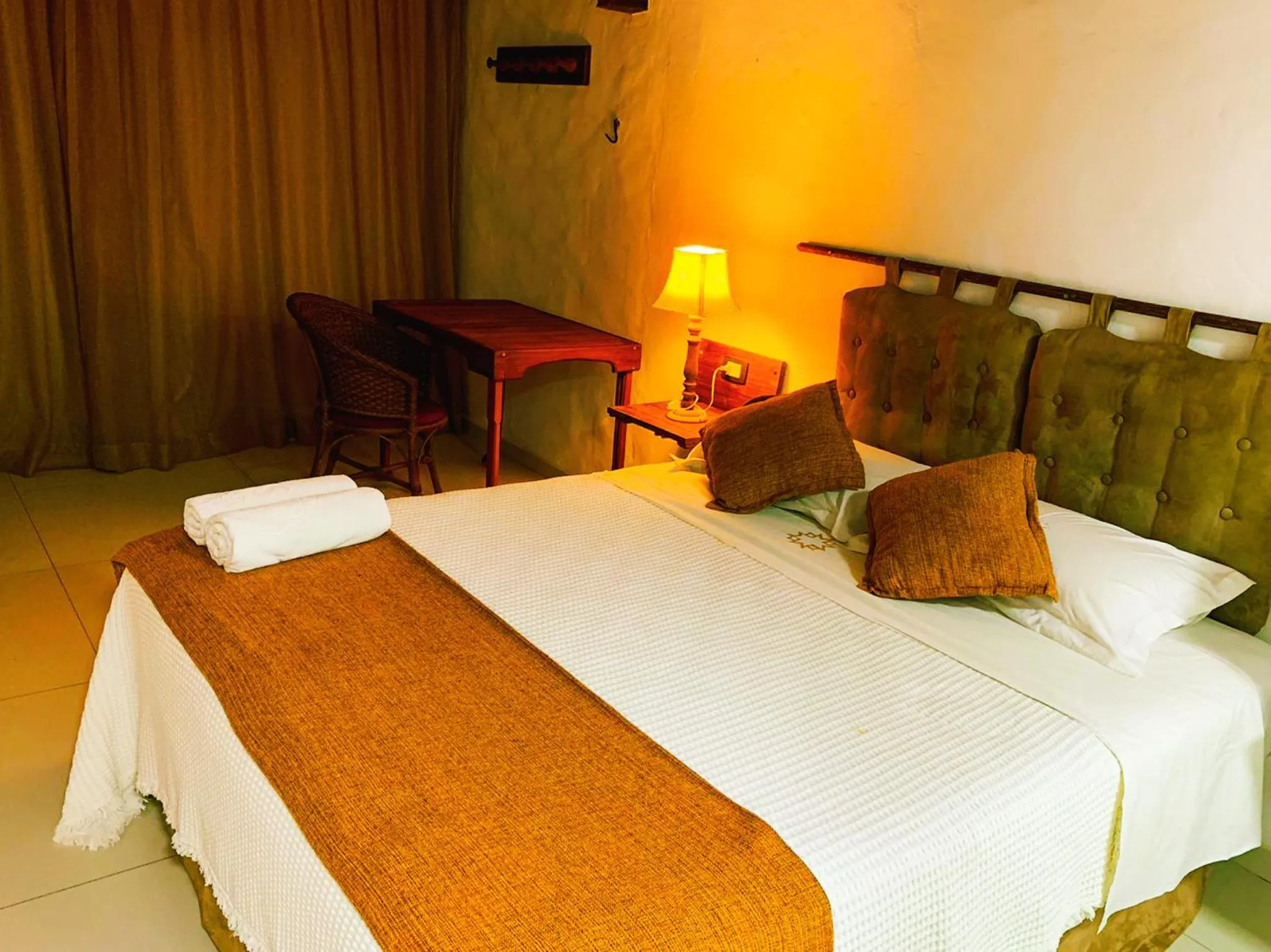 Bed in Pousada Dos Artistas