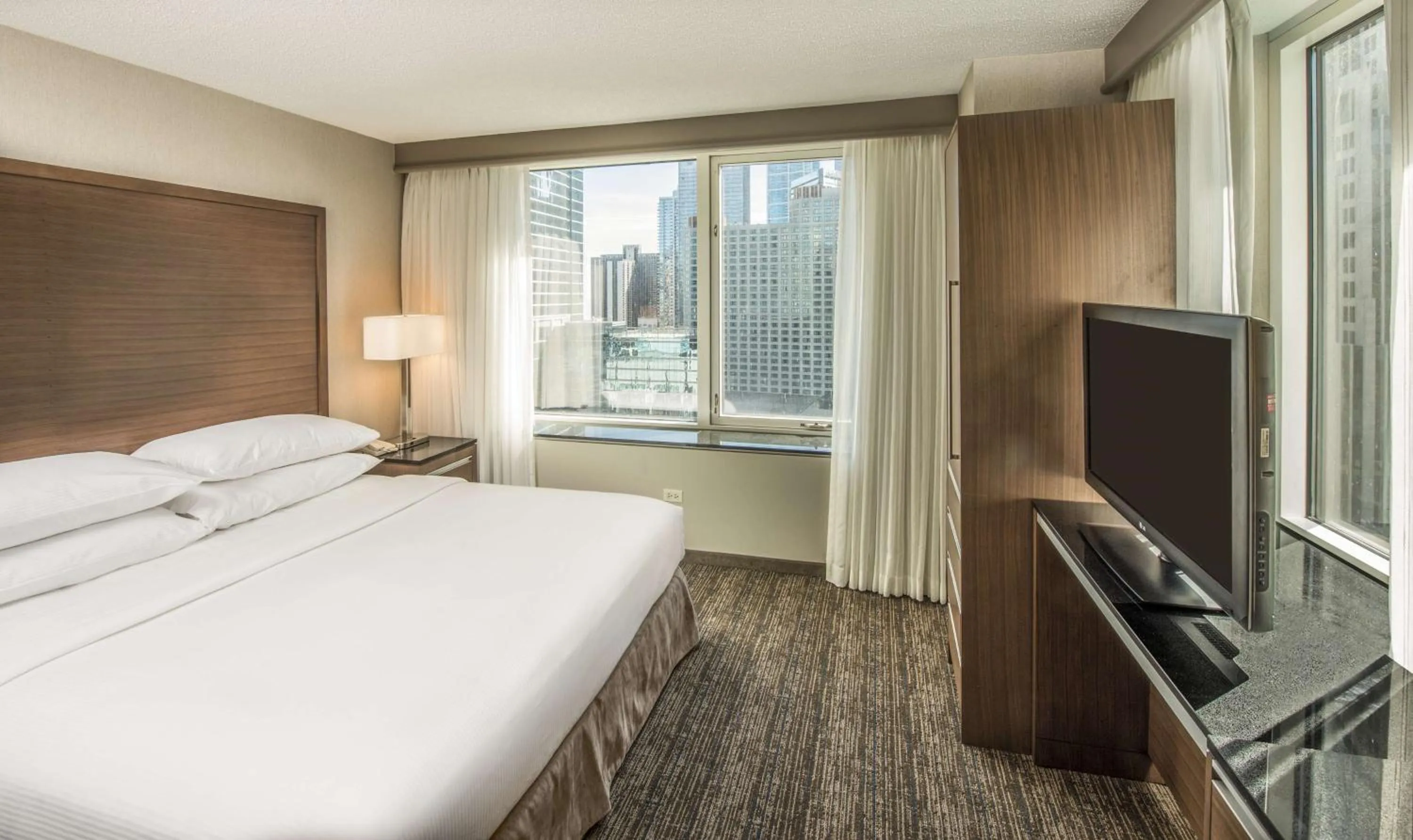 Bed in Embassy Suites by Hilton Chicago Downtown Magnificent Mile