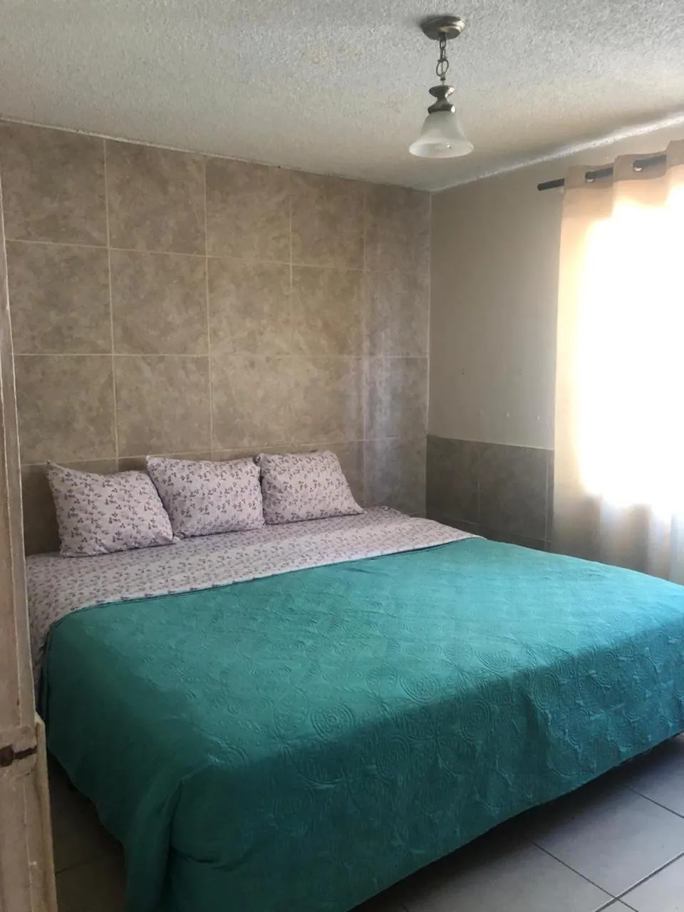 Bed in Departamento Bahia