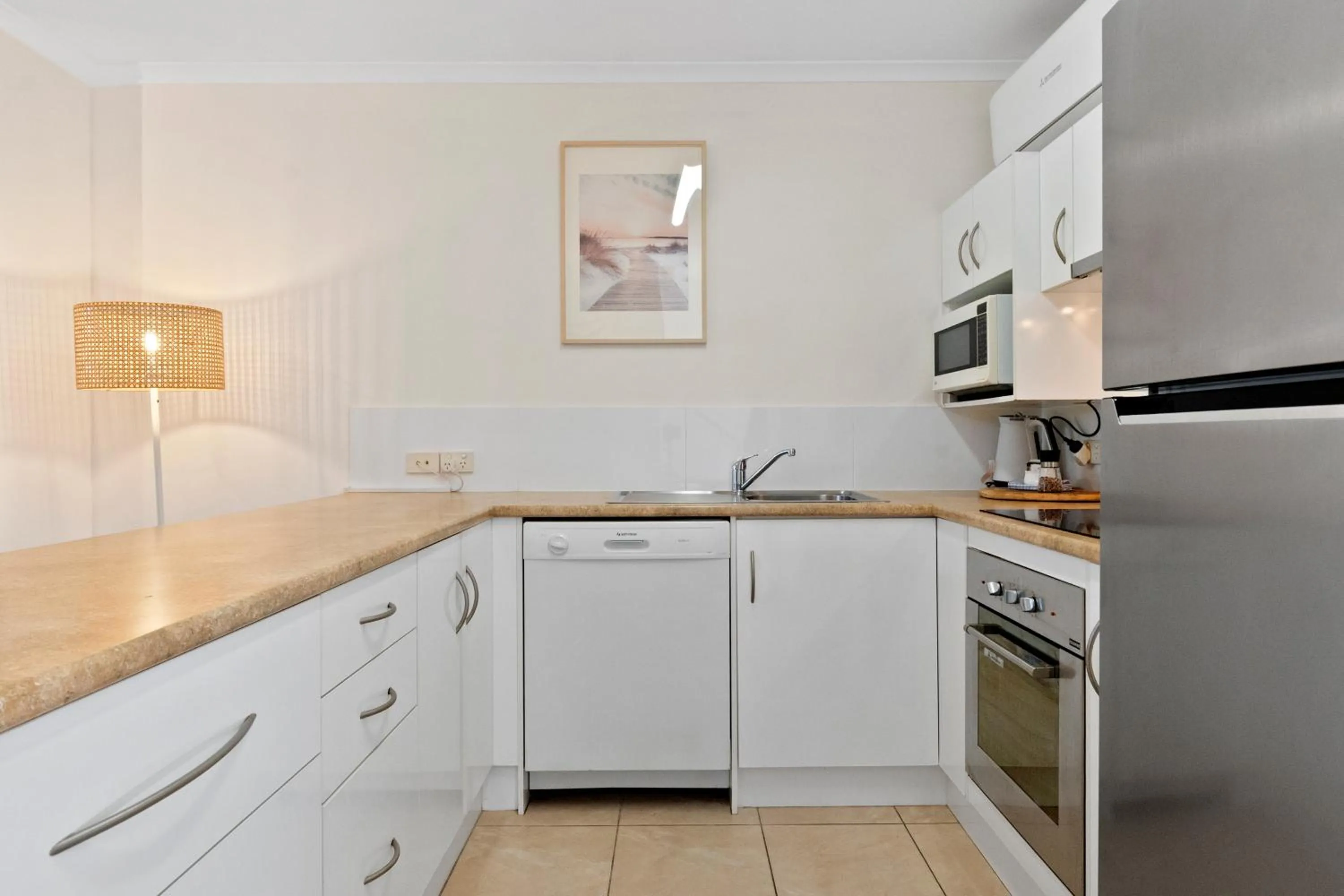 Kitchen or kitchenette in Beach Breakers Resort