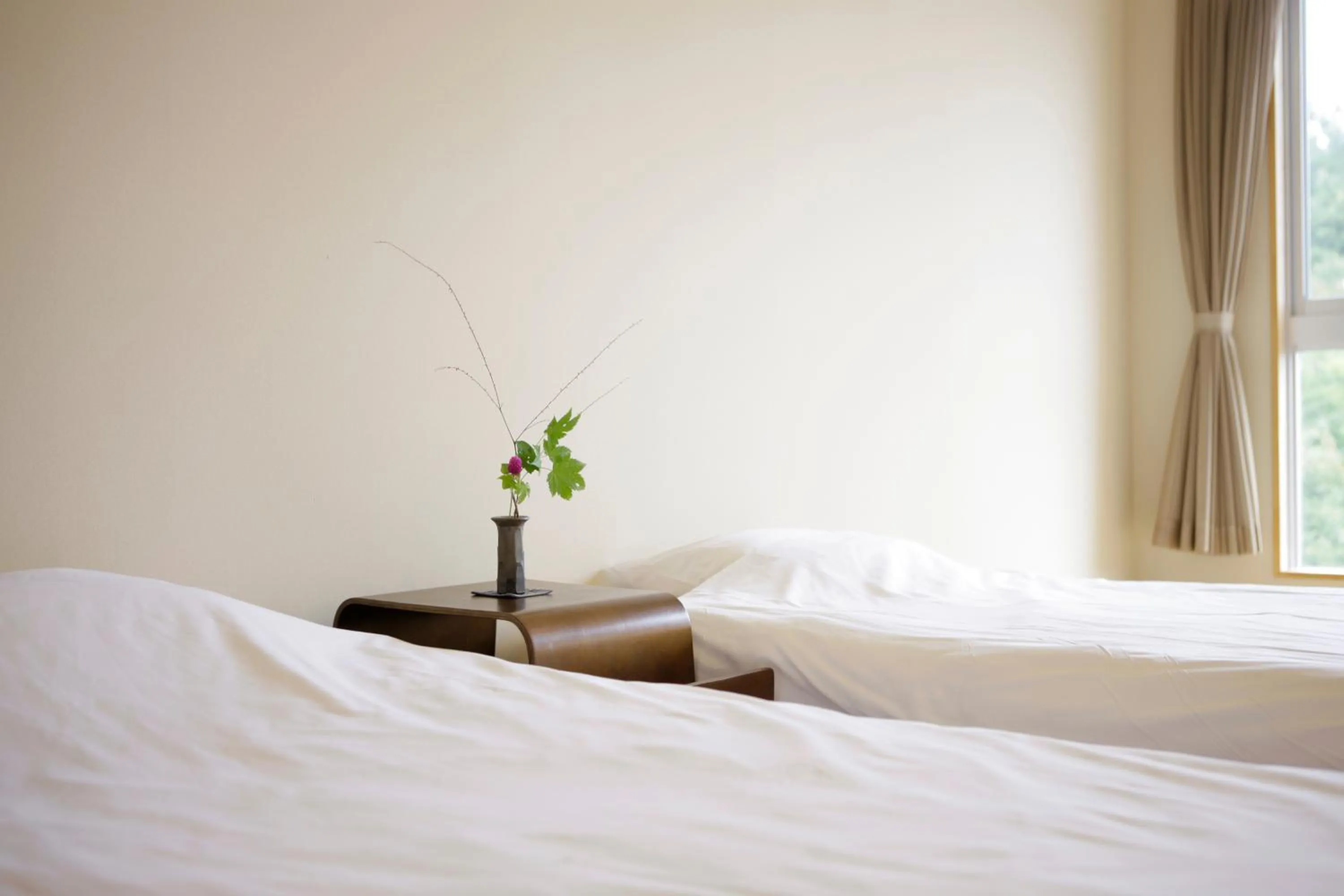 Bed in Kusatsu Hotel Bekkan Wata no Yu (Adult Only)