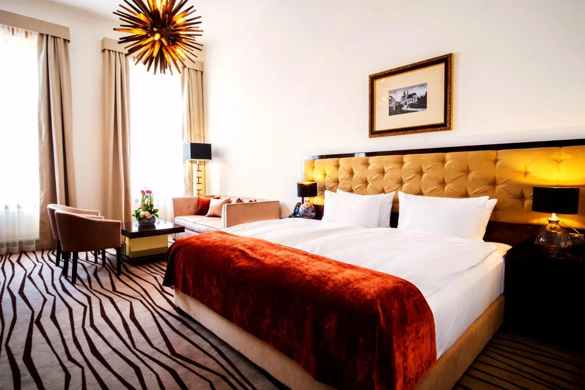 Living room, Bed in Boutique Hotel Slávia