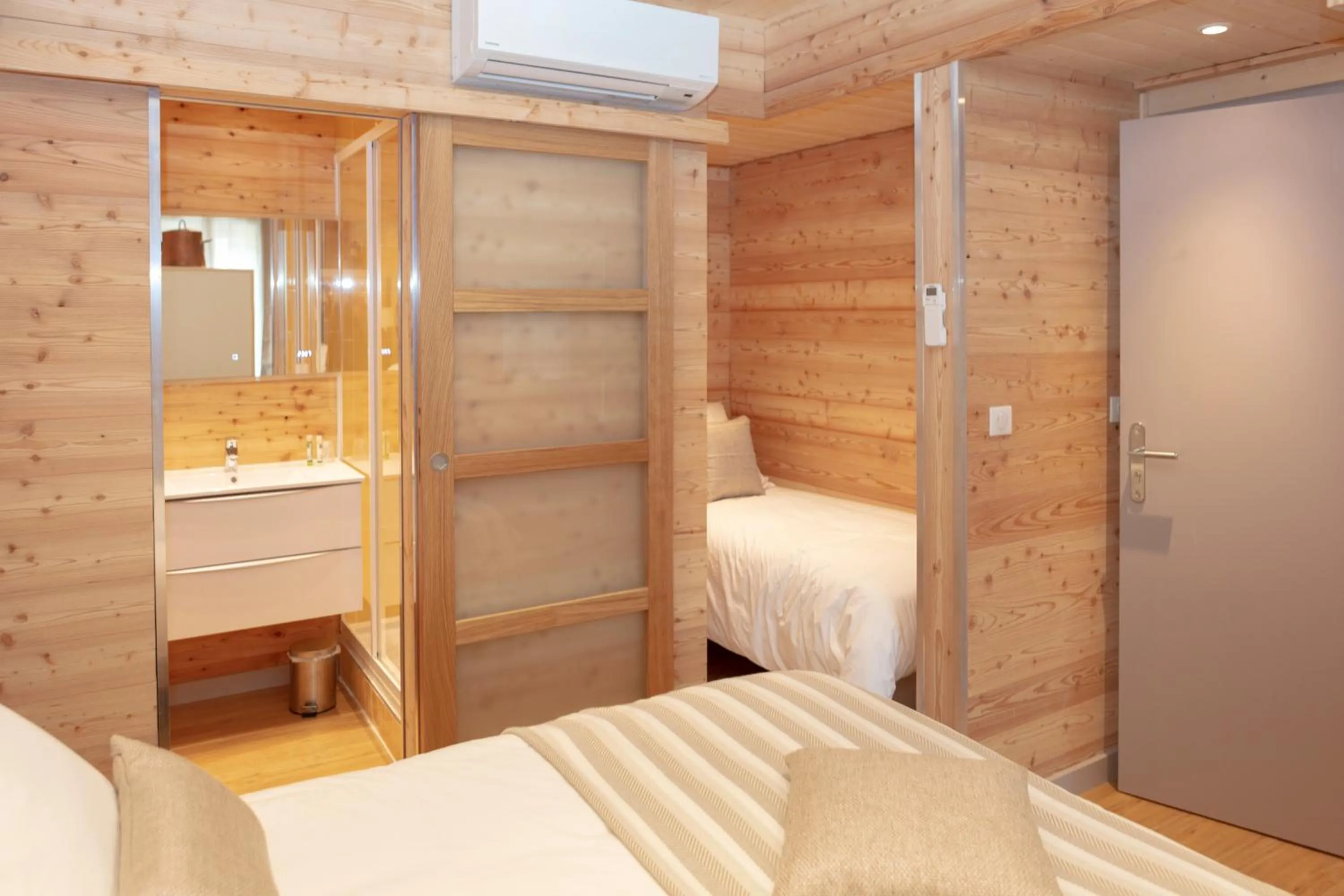 Bed in Relais Des Alpes