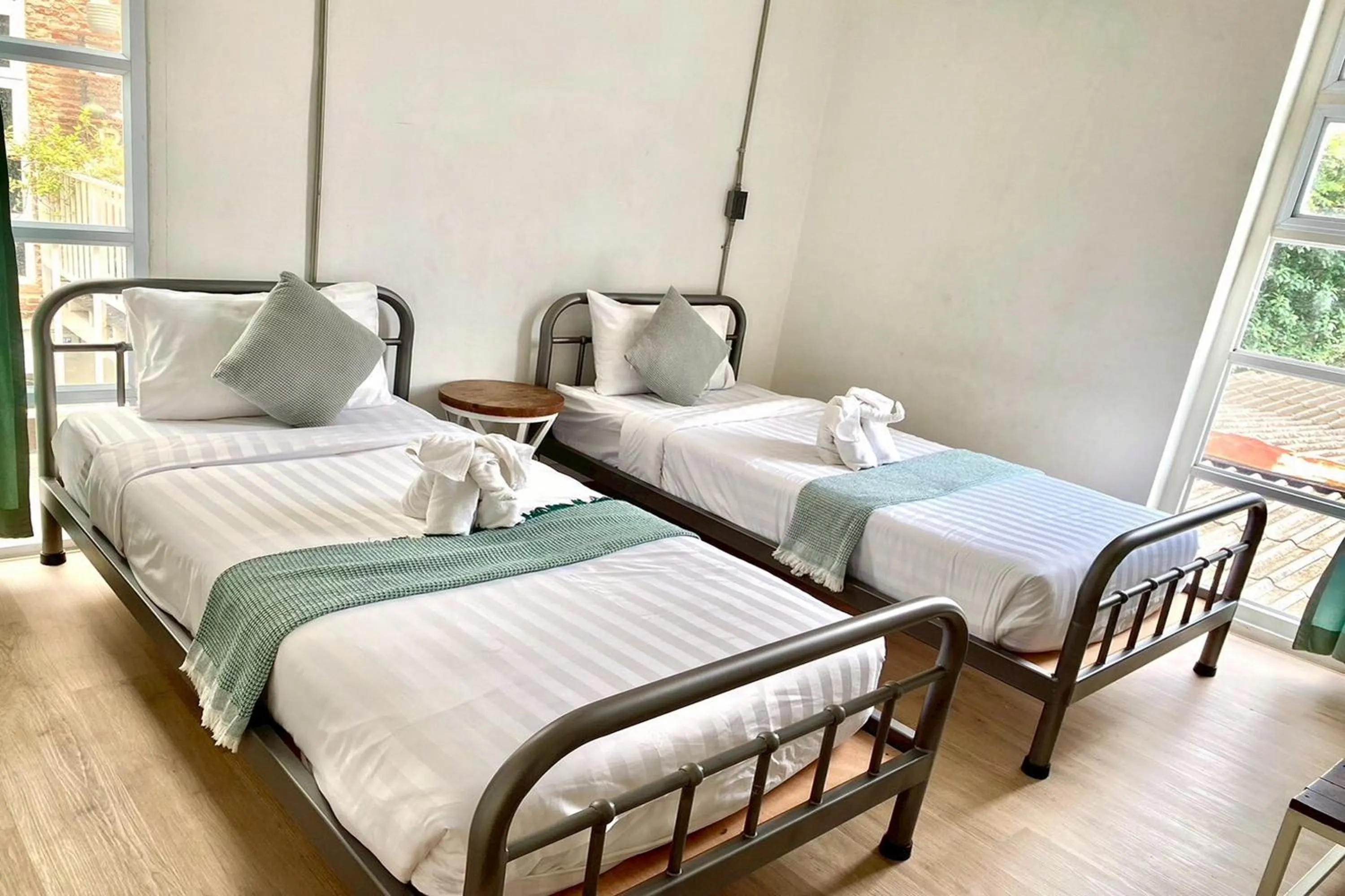 Photo of the whole room, Bed in Memmoth Cafe & Hostel in Lampang