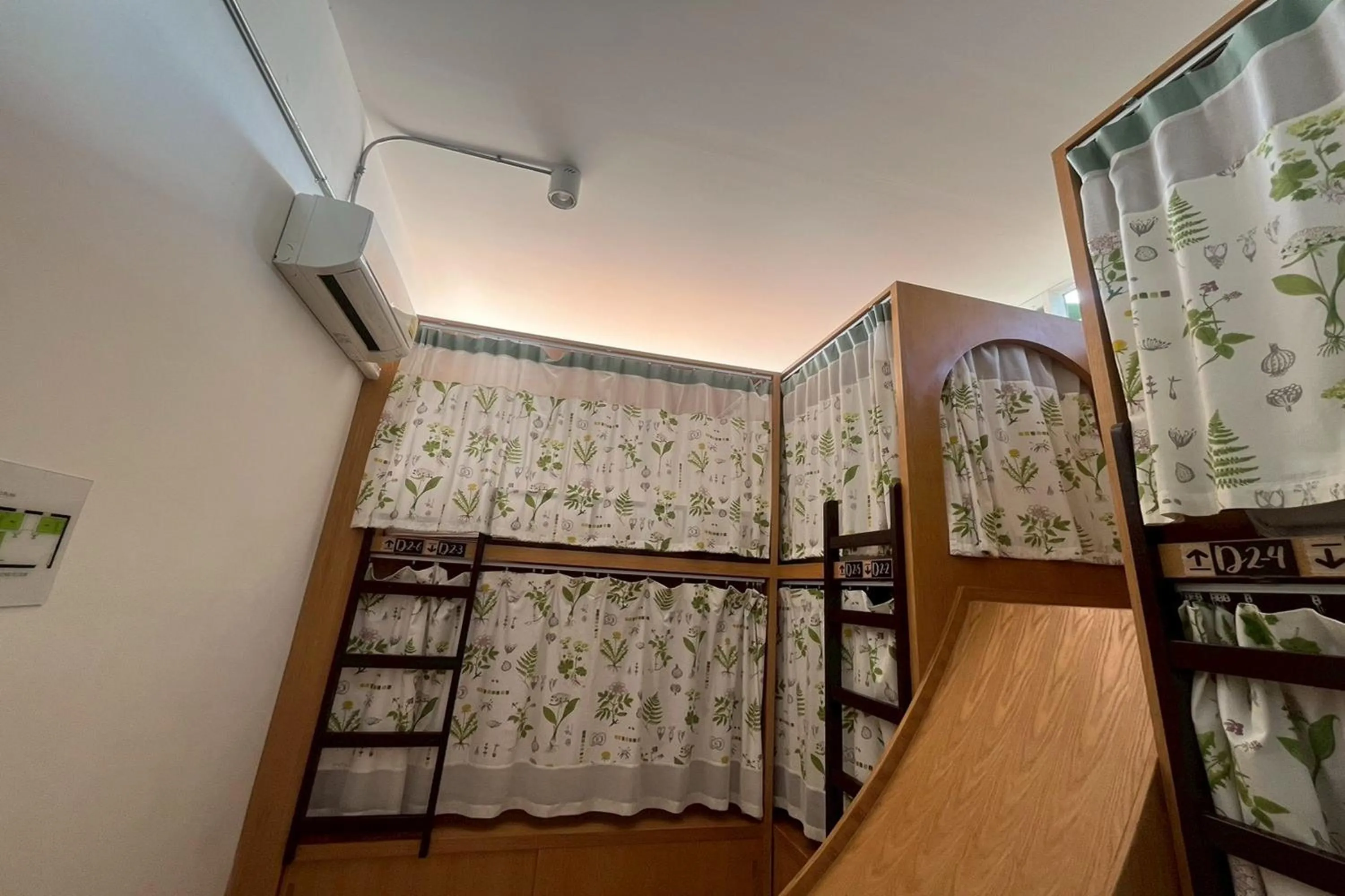 Photo of the whole room, Bed in Memmoth Cafe & Hostel in Lampang