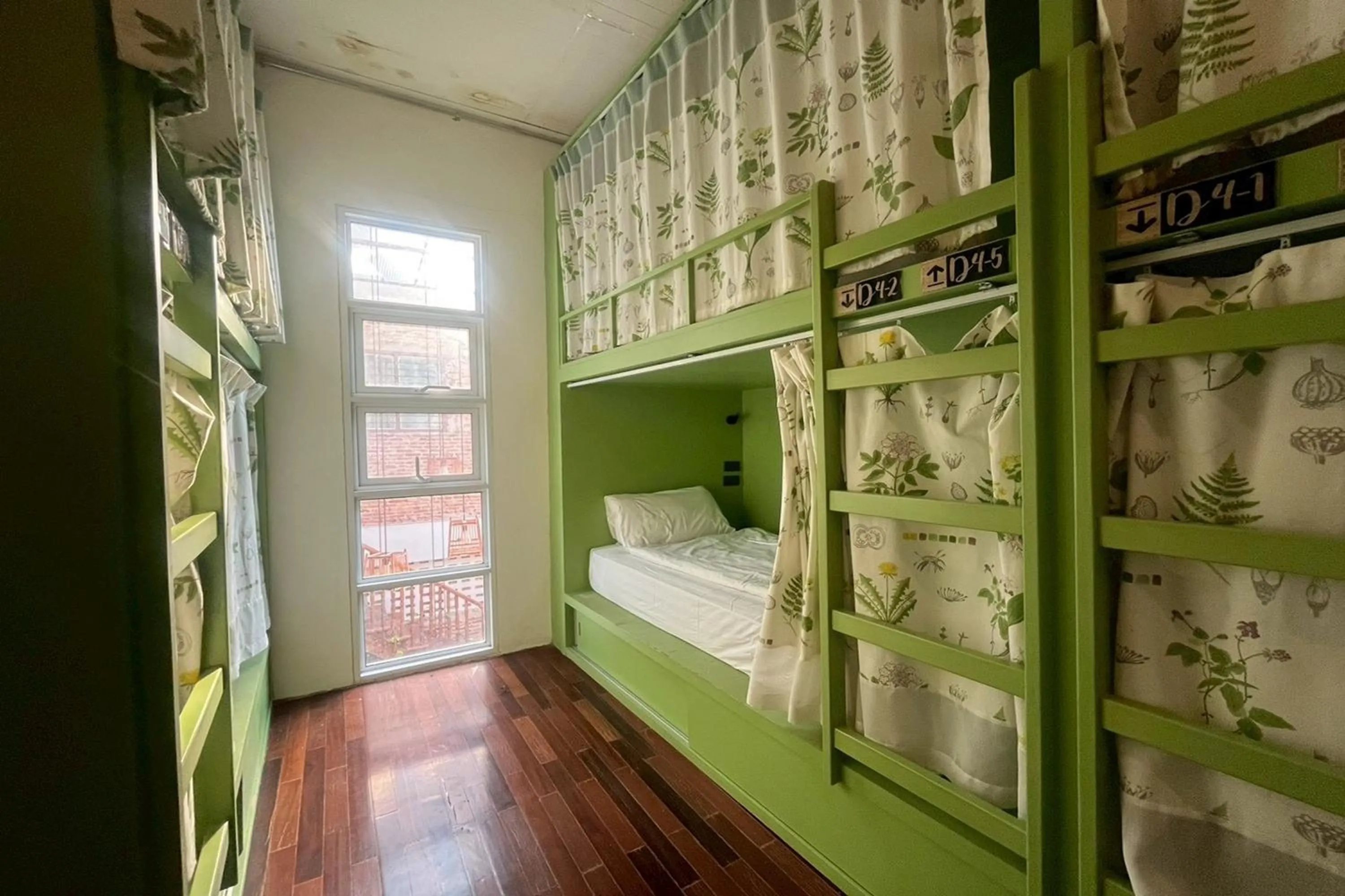 Photo of the whole room, Bed in Memmoth Cafe & Hostel in Lampang