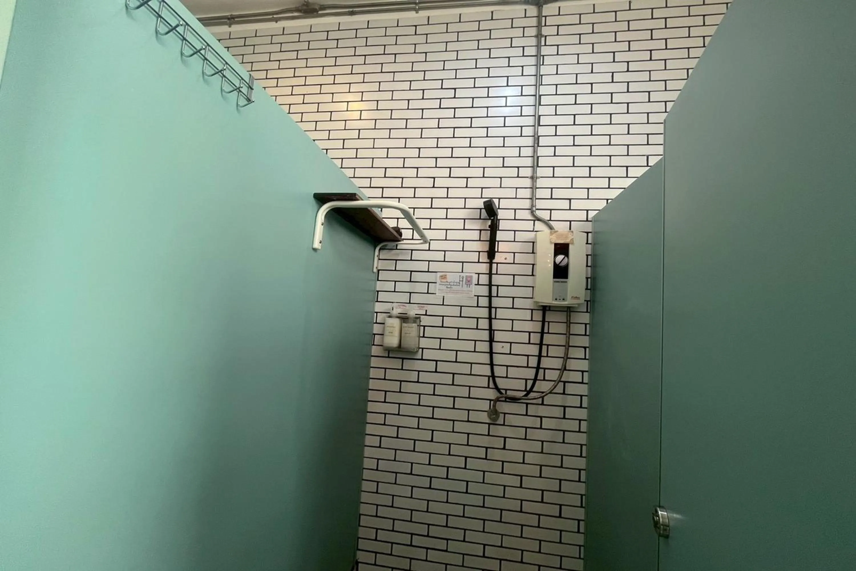 Shower in Memmoth Cafe & Hostel in Lampang