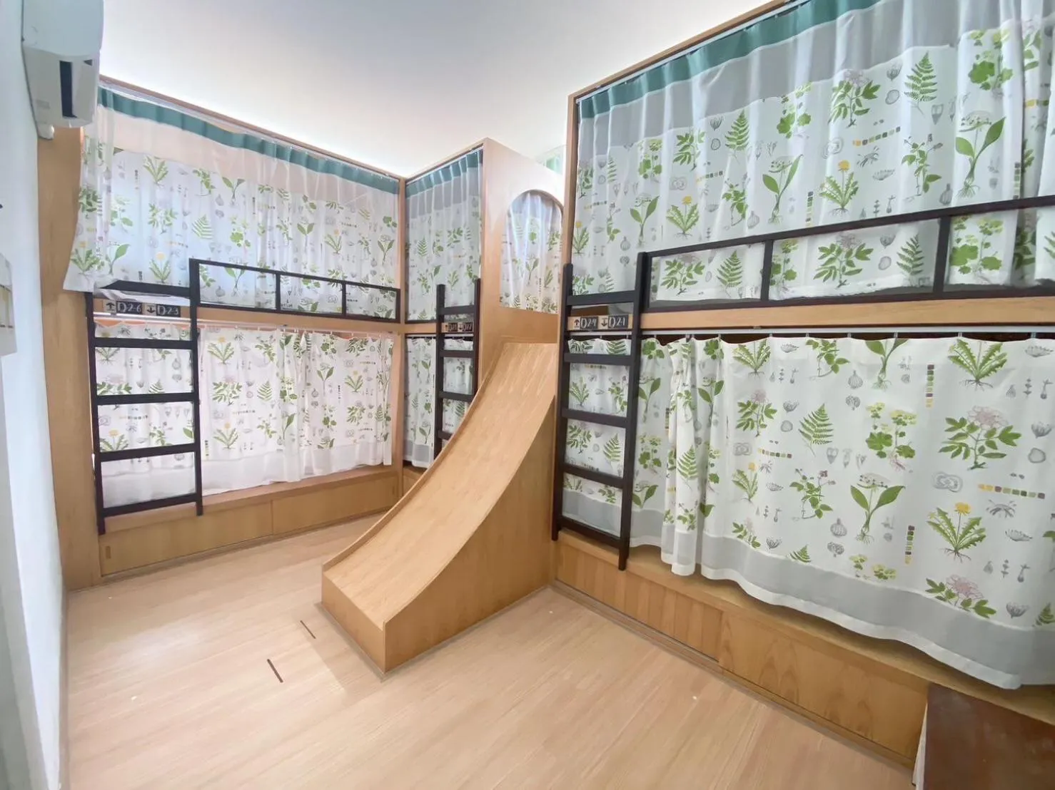 Bedroom in Memmoth Cafe & Hostel in Lampang