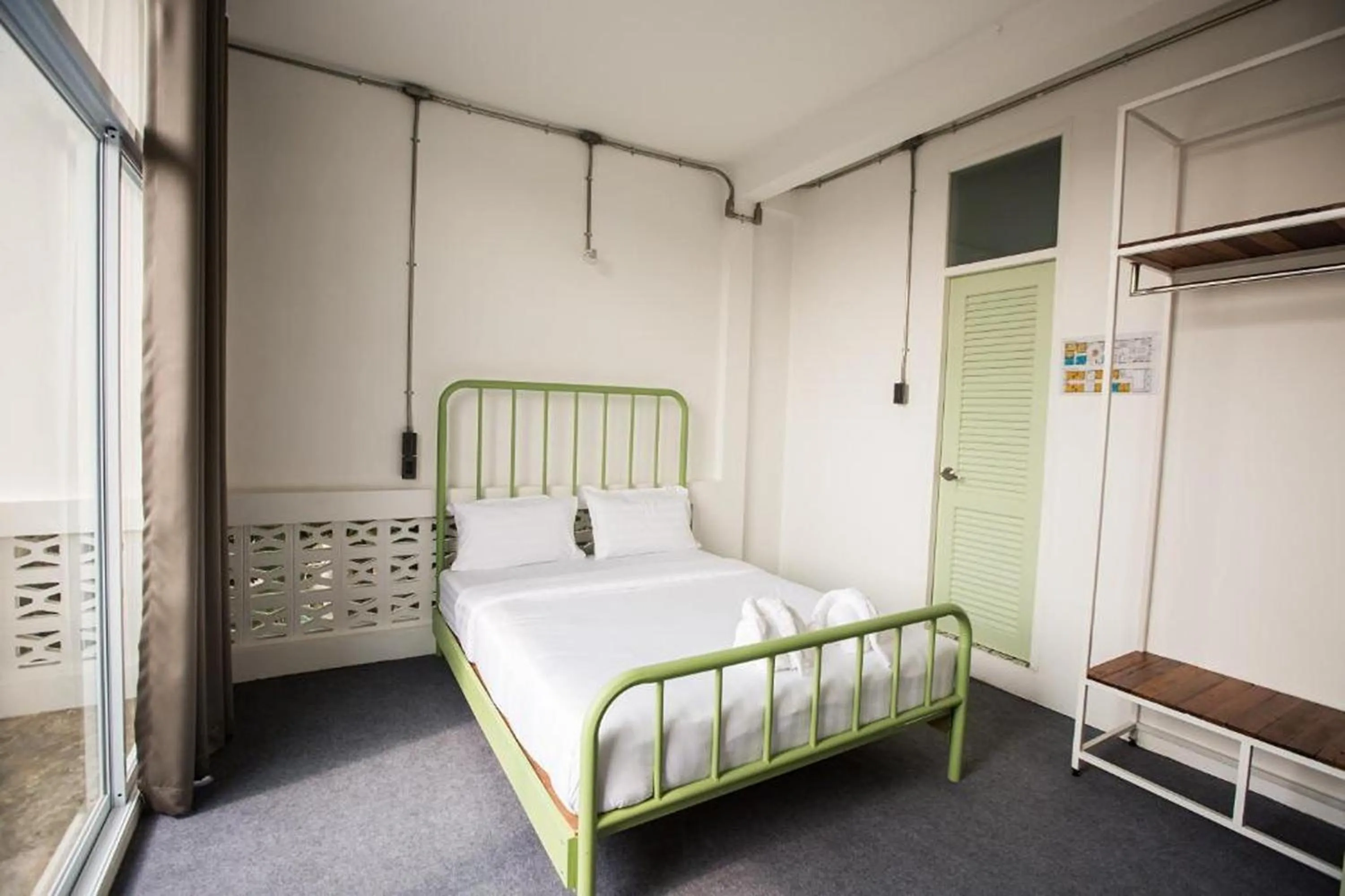 Photo of the whole room, Bed in Memmoth Cafe & Hostel in Lampang