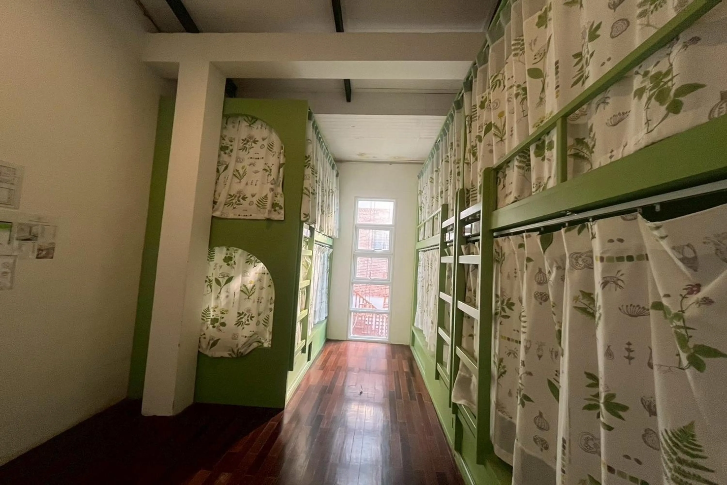 Bedroom in Memmoth Cafe & Hostel in Lampang