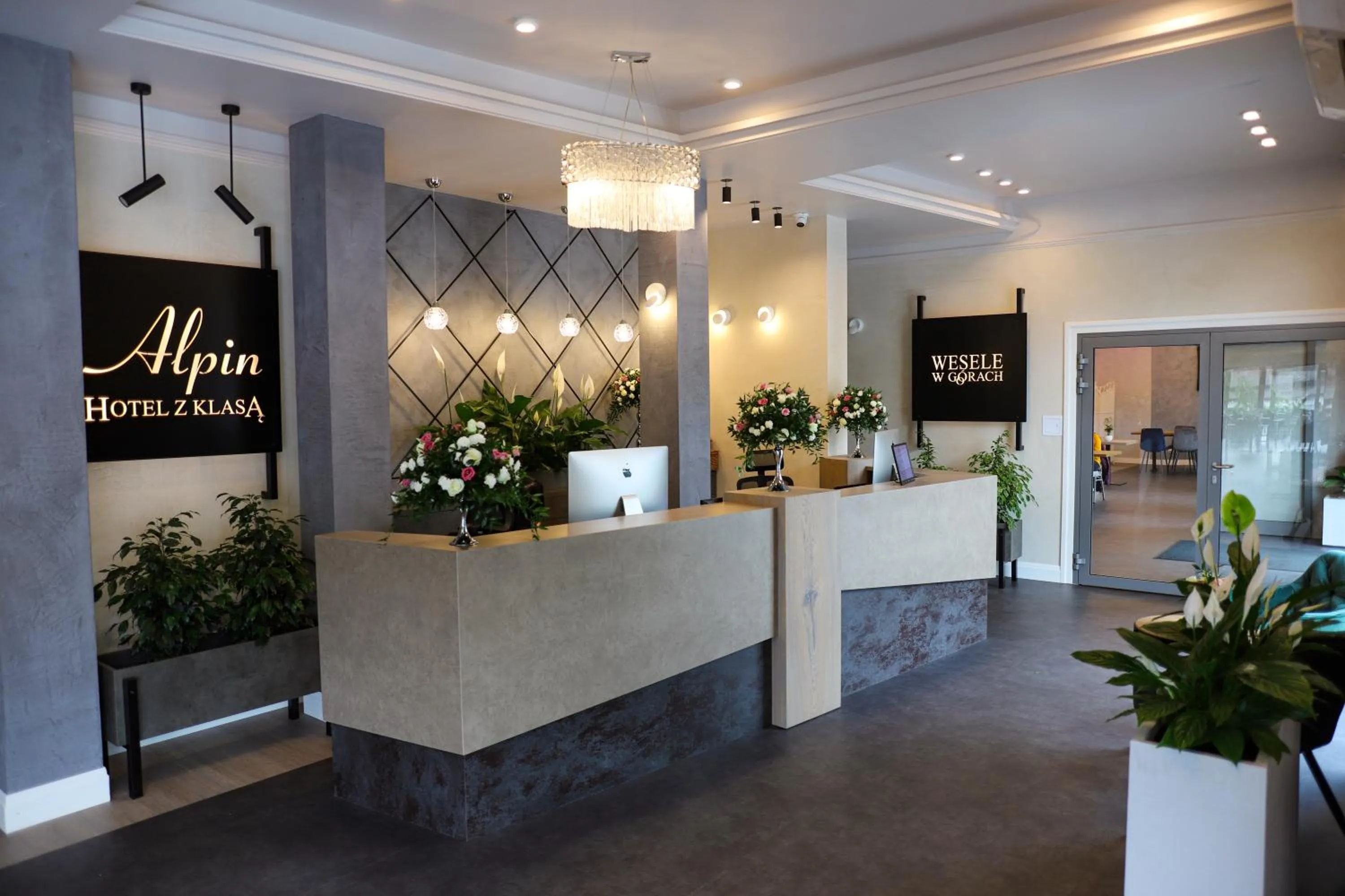 Property logo or sign in Hotel Alpin