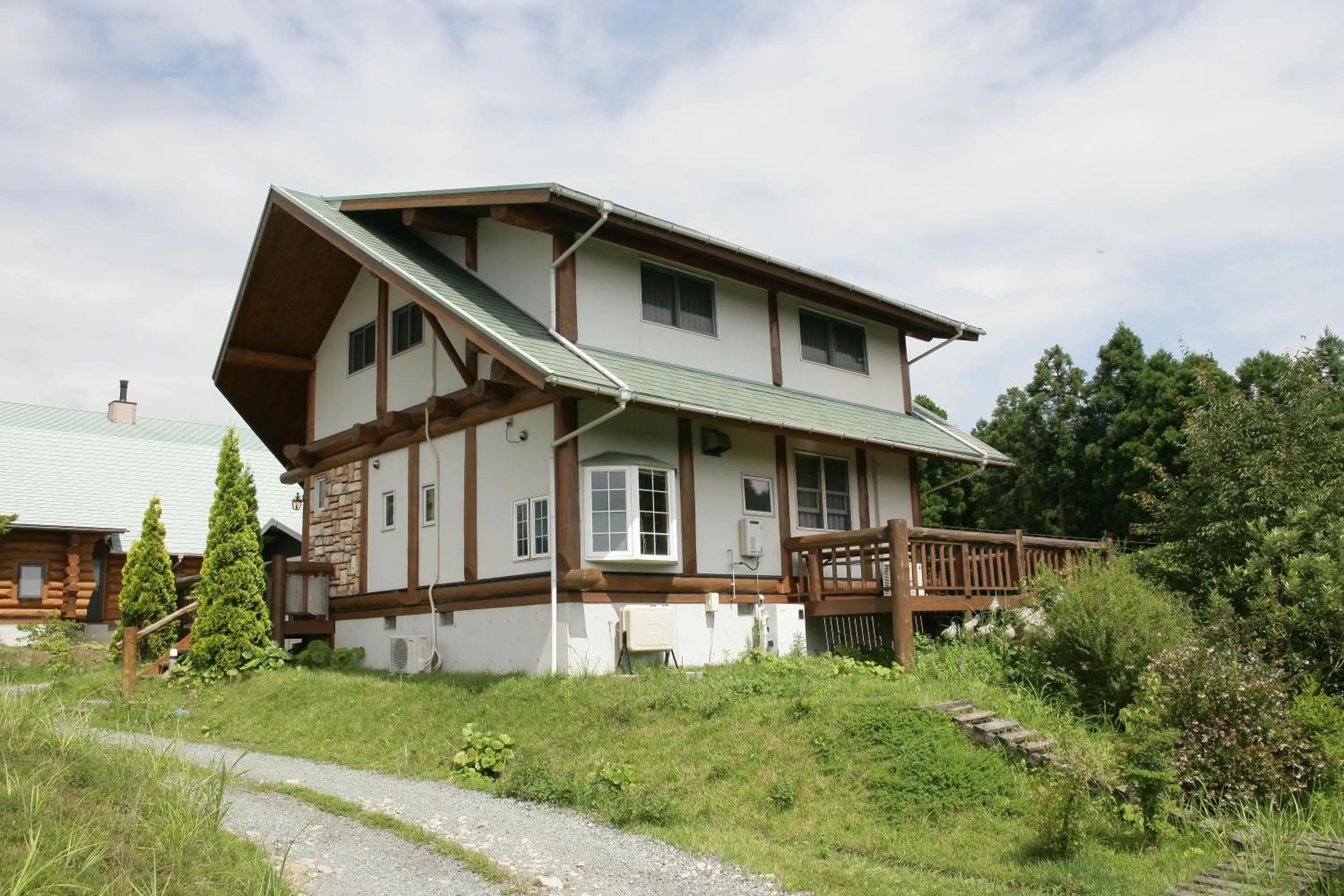 Facade/entrance in Kurokawa Mori no Cottage
