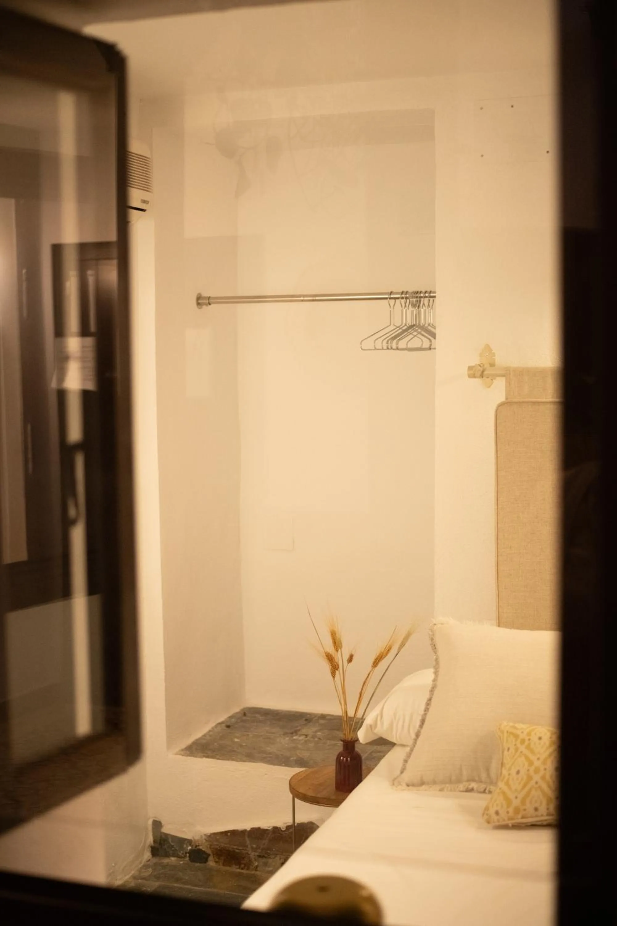 Bed in HOTEL BOUTIQUE ALMA ANDALUSí