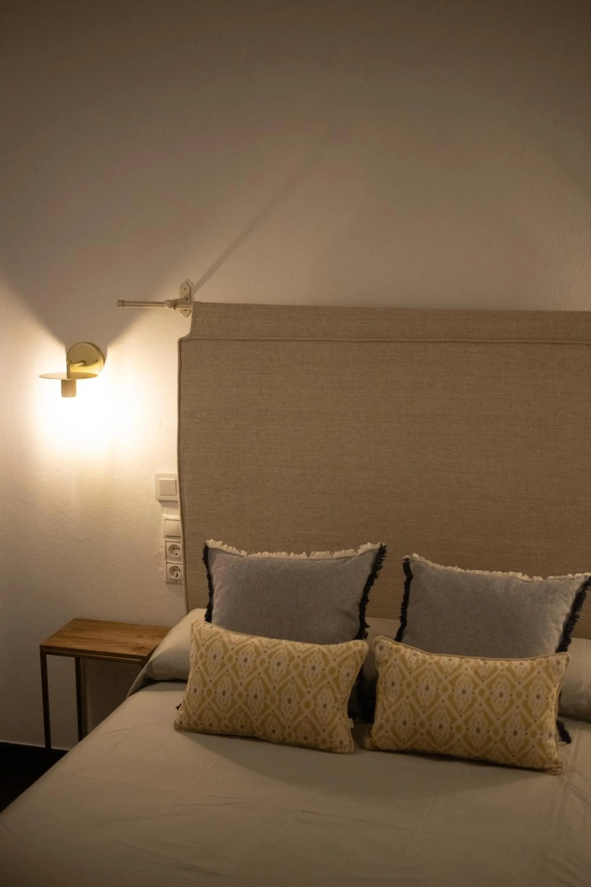 Bed in HOTEL BOUTIQUE ALMA ANDALUSí