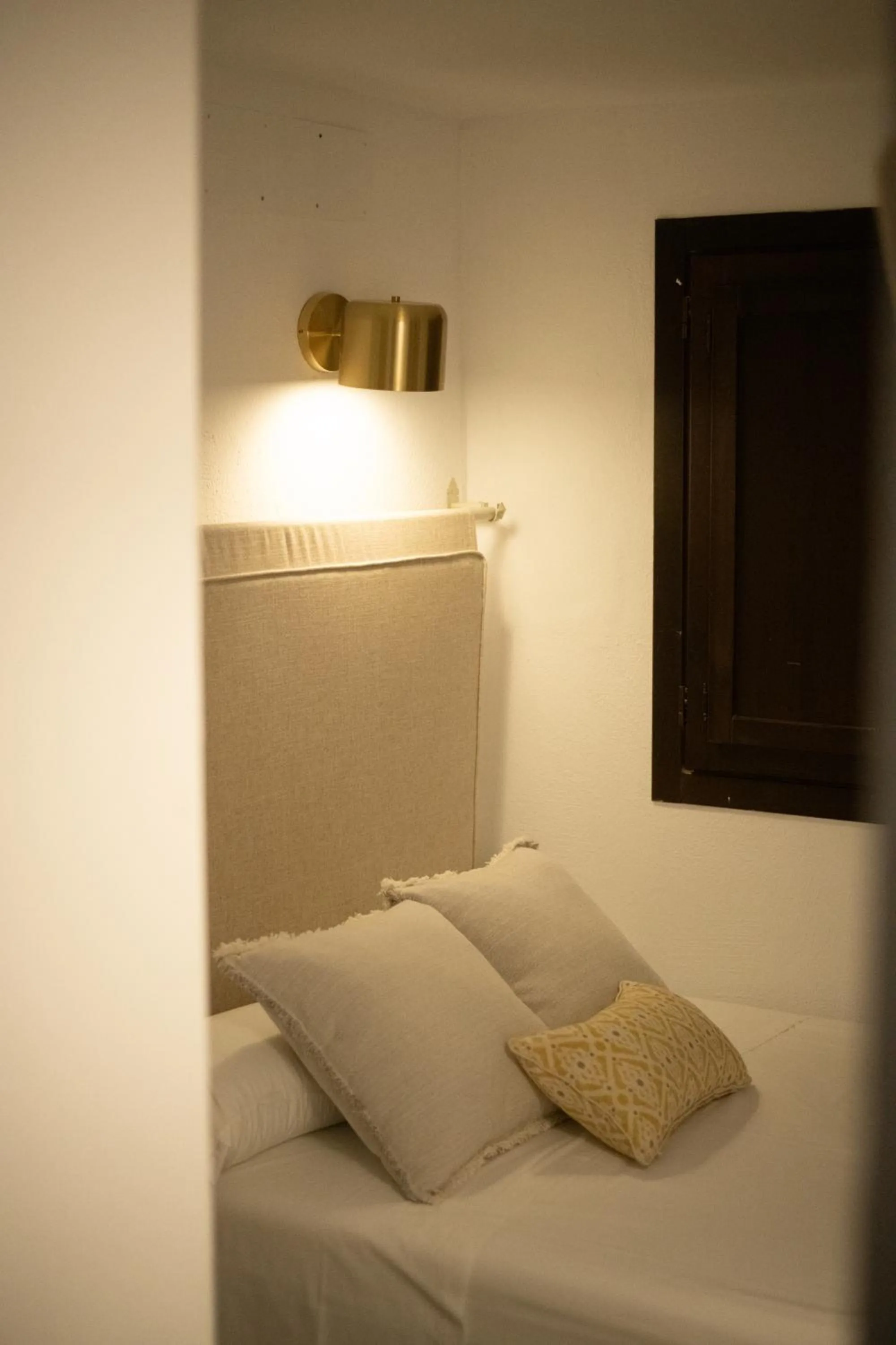 Bed in HOTEL BOUTIQUE ALMA ANDALUSí