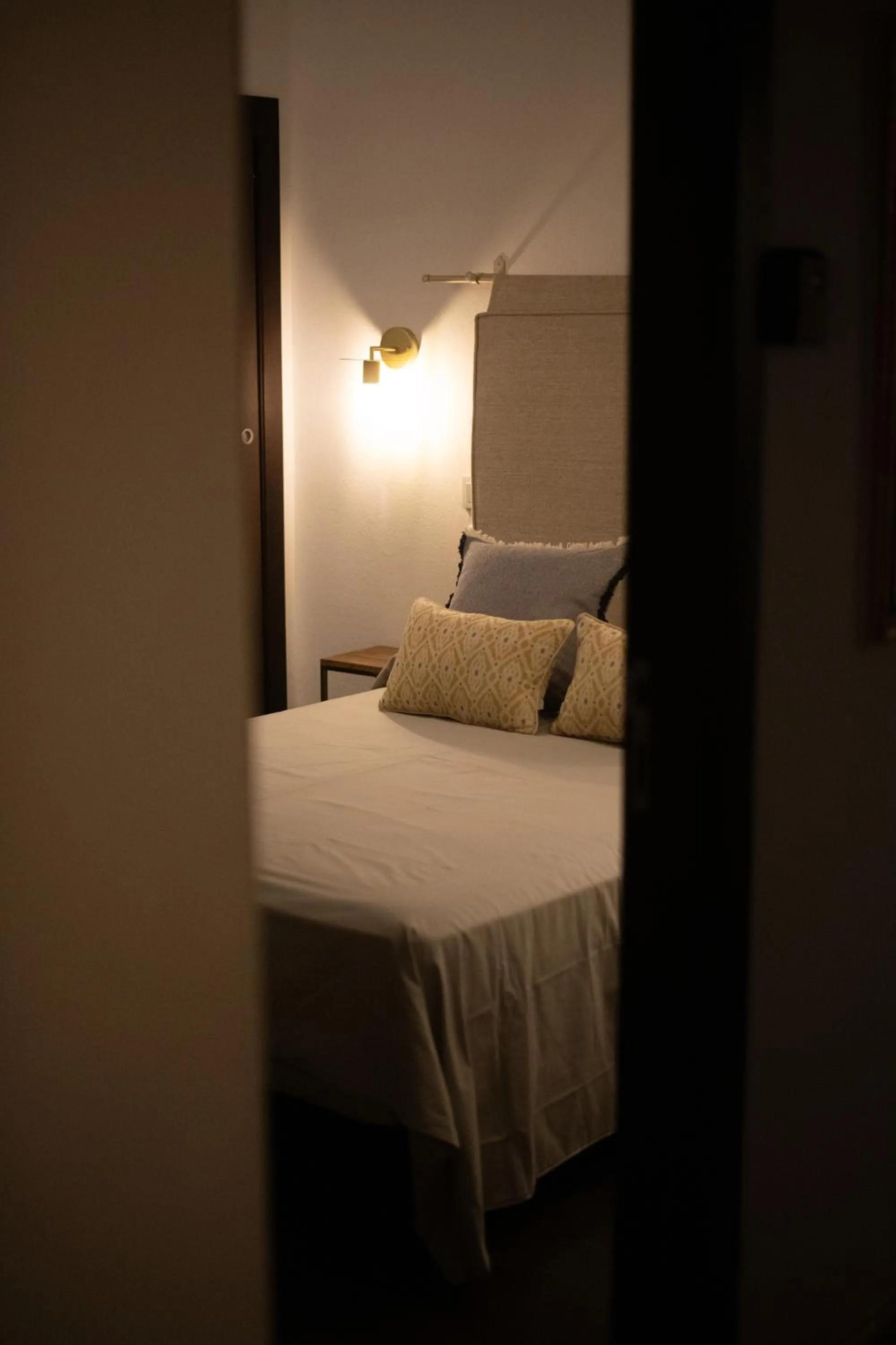 Bed in HOTEL BOUTIQUE ALMA ANDALUSí